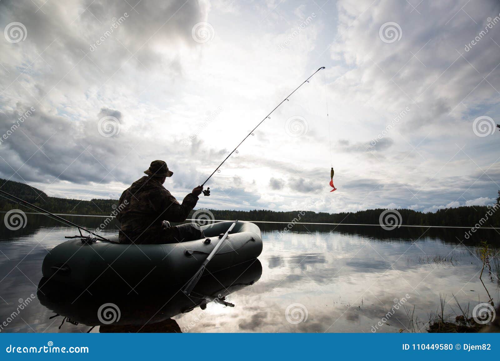 Man fishing from the boat stock photo. Image of hobby - 110449580