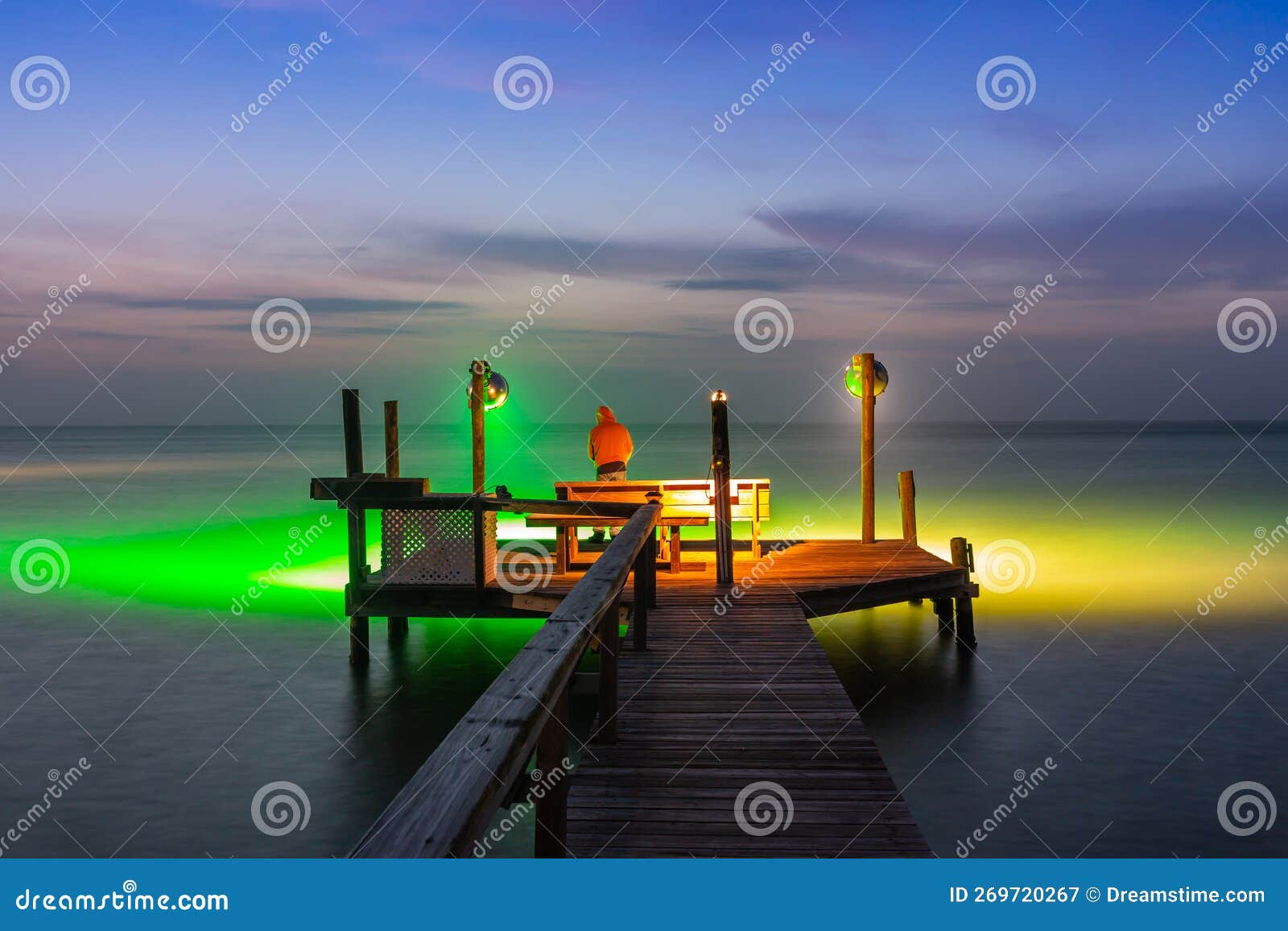 Man on Fishing Pier stock image. Image of sunset, harvey - 269720267