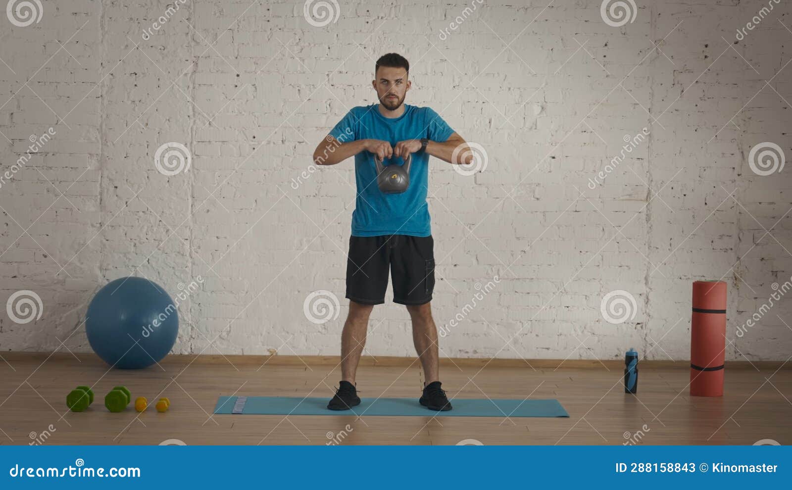 Man Fitness Coach in Sportswear Doing Pulls To Chest with Kettlebell ...