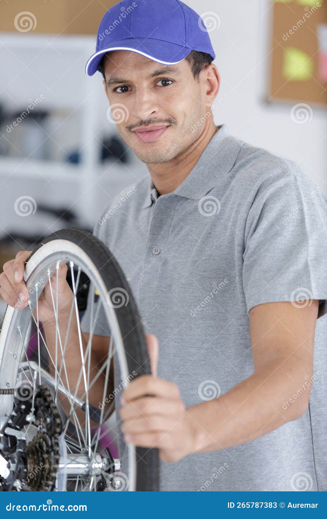 Man Fixing Bike Wheel in Store Stock Image Image of breakdown, drive