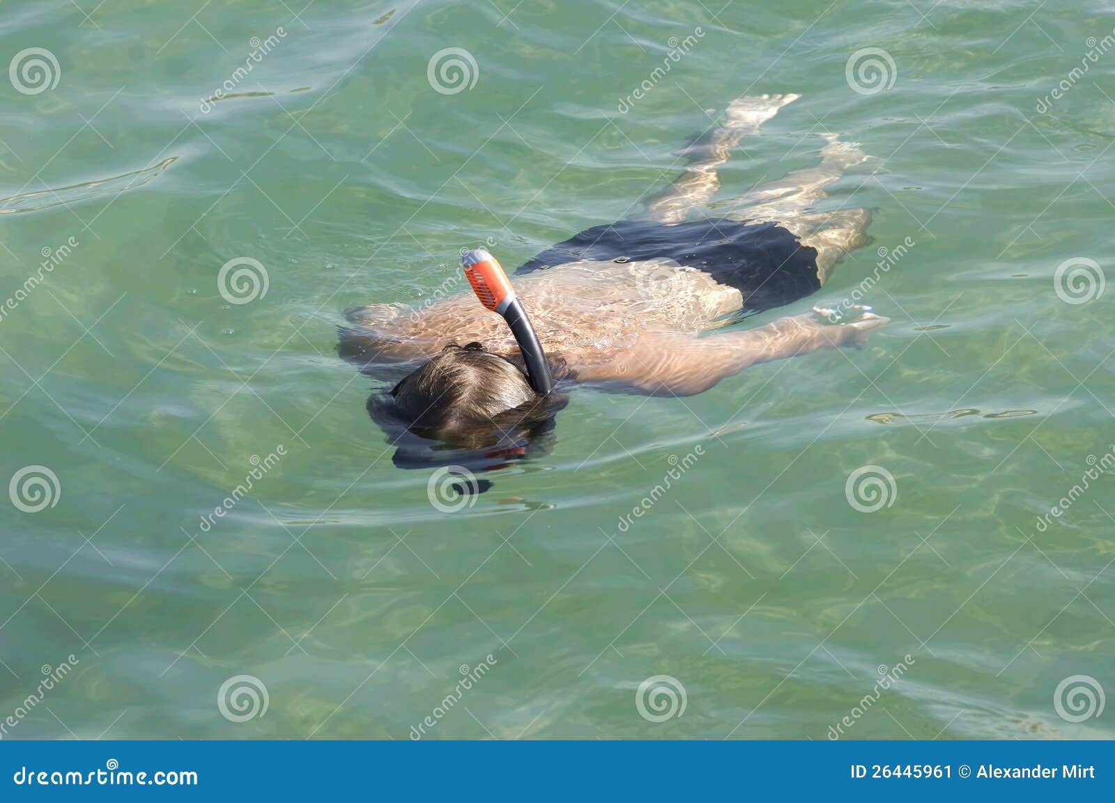 Man floats in the sea stock image. Image of leisure, blue 26445961