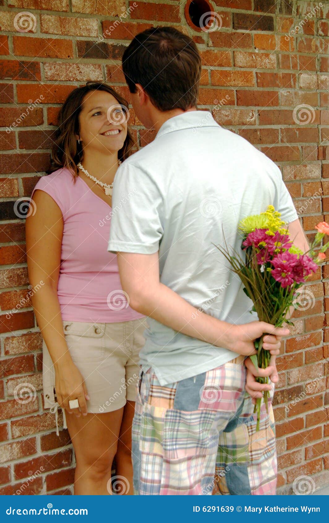 Man with Flowers for His Girlfriend Stock Image Image of love, brick 6291639