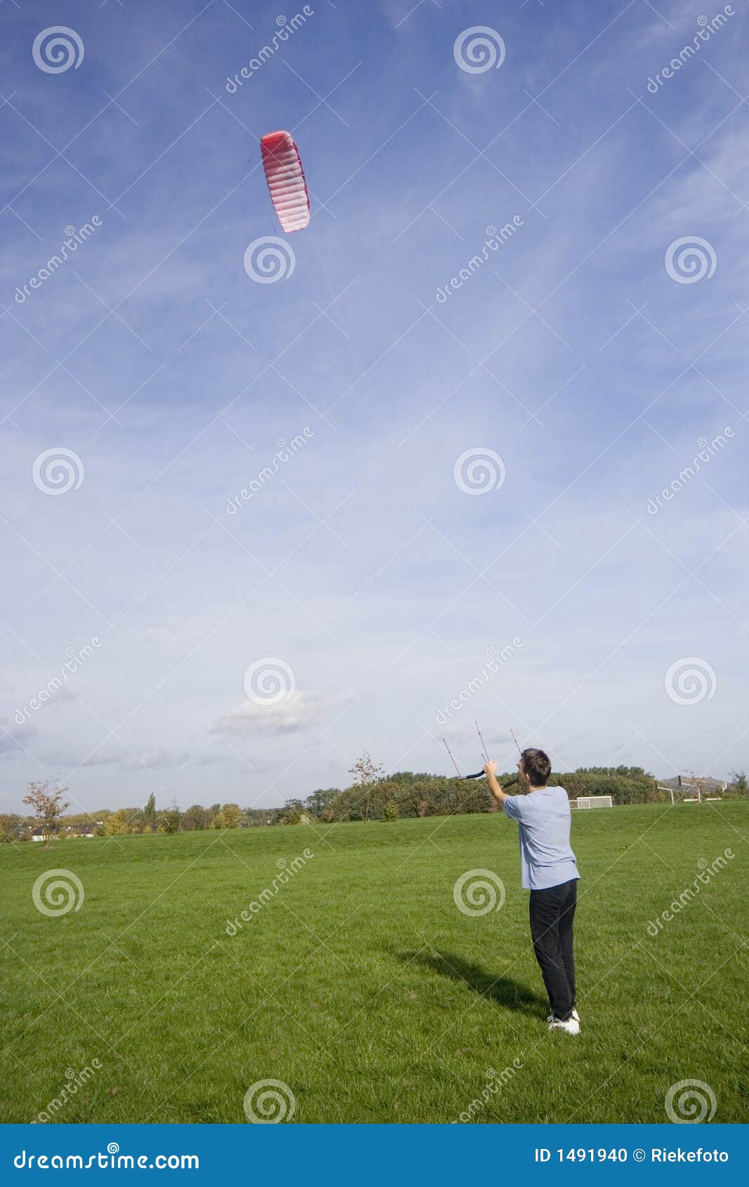 Man flying a power kite stock photo. Image of flying, middle 1491940