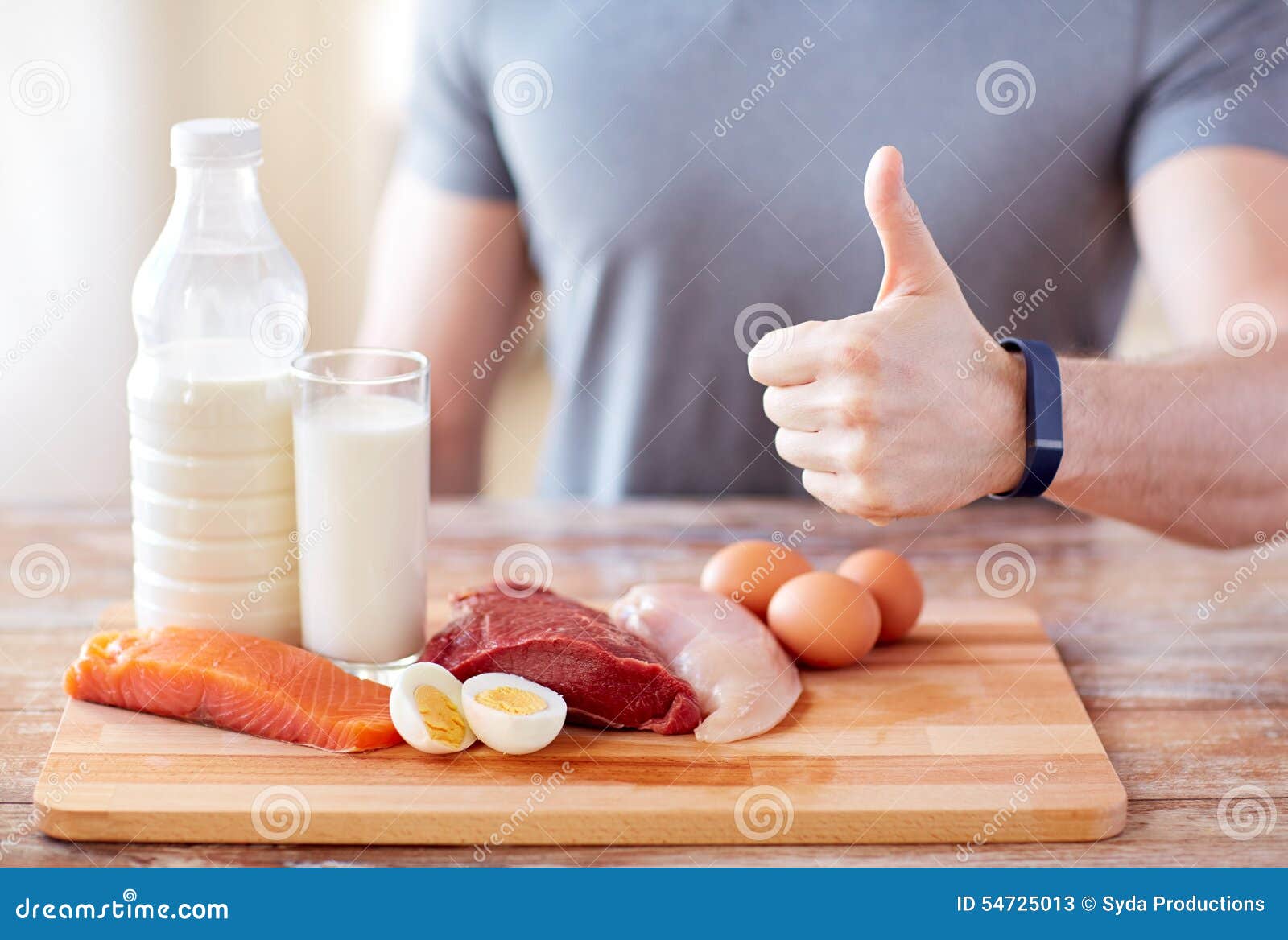 Man With Food Rich In Protein Showing Thumbs Up Stock Photo  Image: 54725013