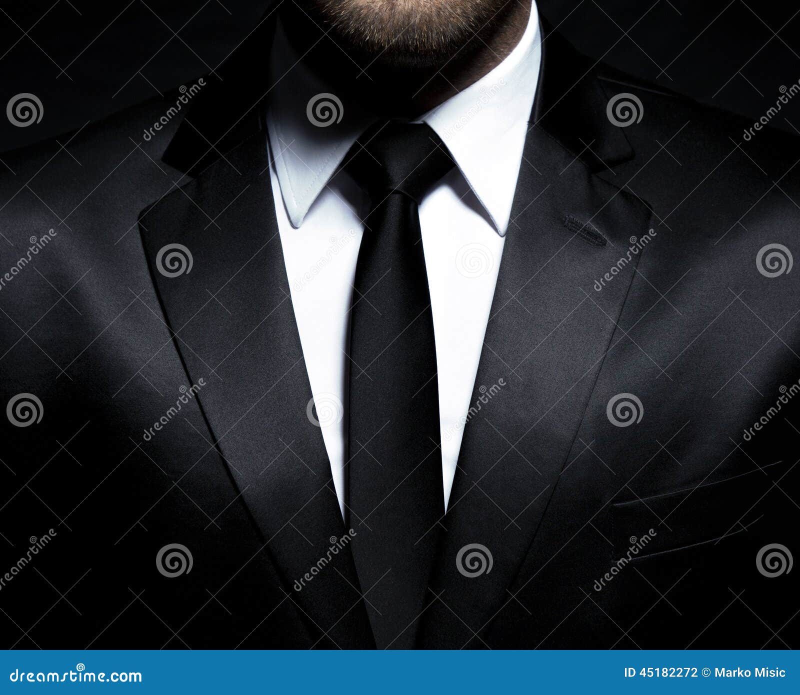 man gentleman in black suit and tie