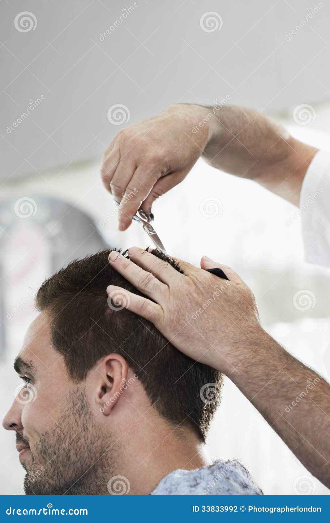 Man Getting An Haircut From Hairdresser Stock Photo 