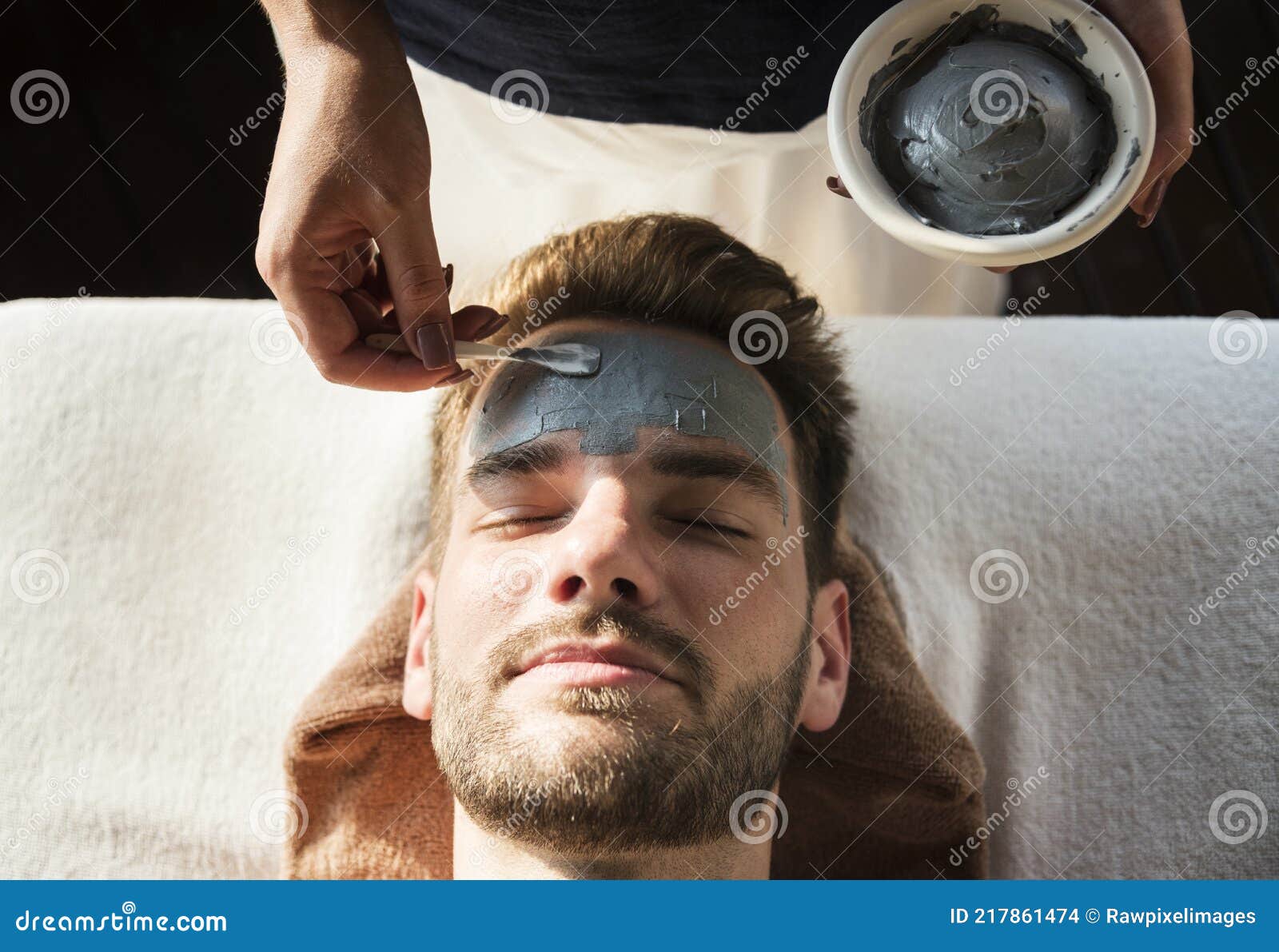 Man Getting a Mud Mask at a Spa Stock Photo Image of mask, massage