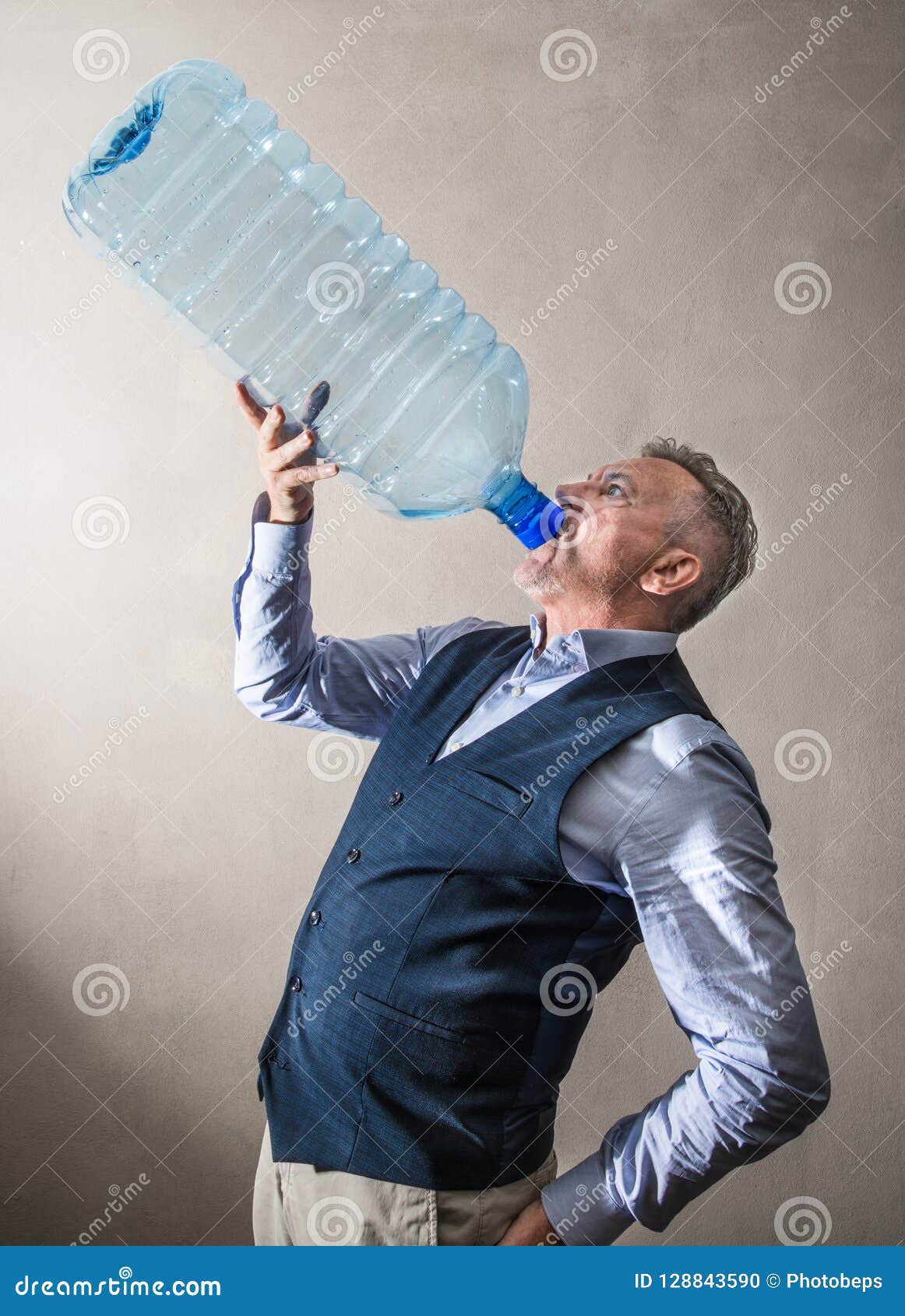 Man with a Giant Water Bottle Stock Photo - Image of plastic, fantasy:  128843590