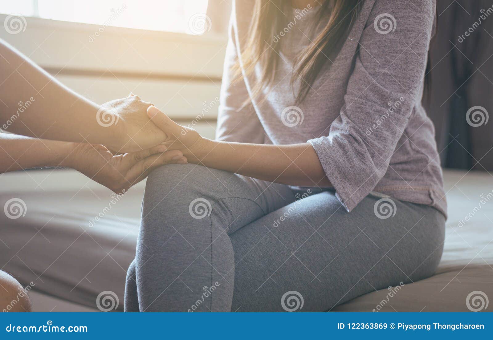 man giving hand to depressed woman patient,personal development including life coaching therapy sessions and speech therapy,mental