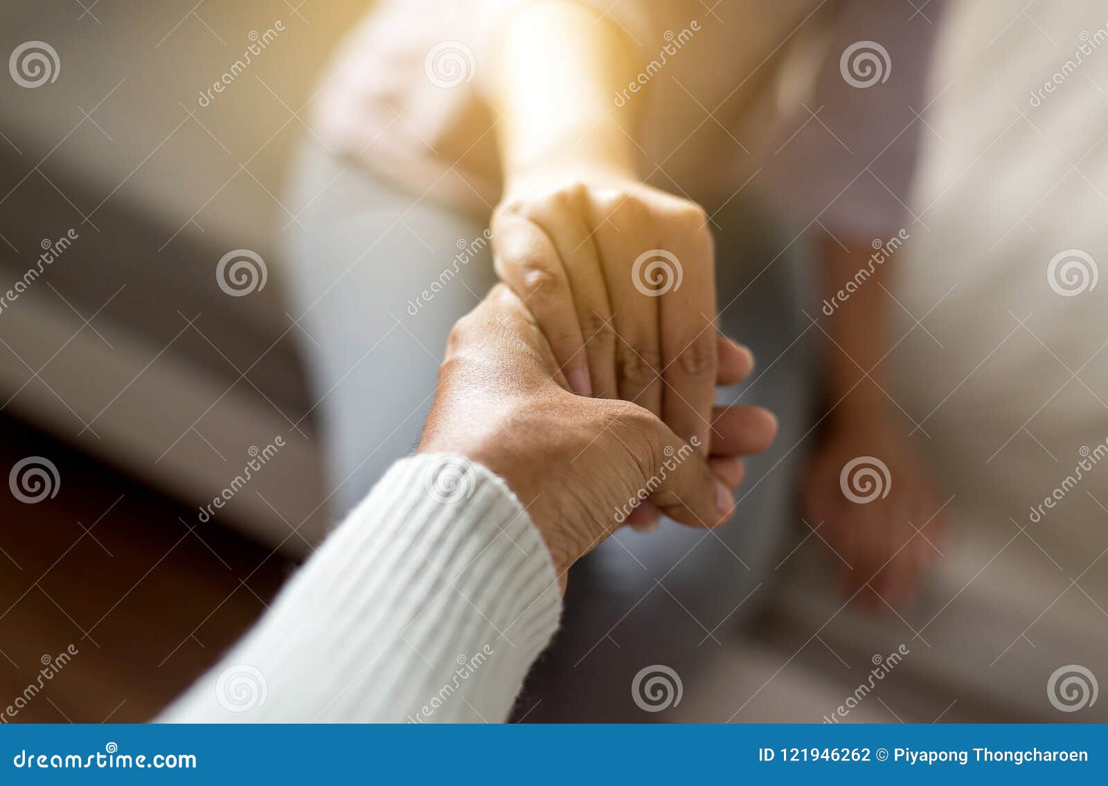 man giving hand to depressed woman,psychiatrist holding hands patient,mental health care concept