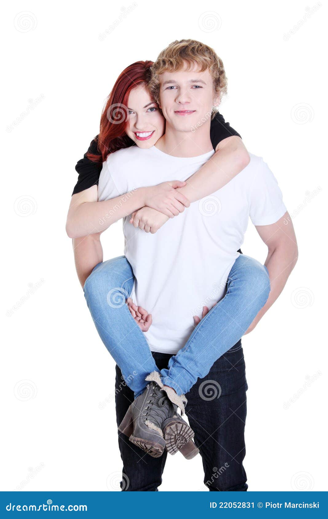 Man giving to girlfriend piggyback ride Stock Photo by ©gstockstudio  147713371