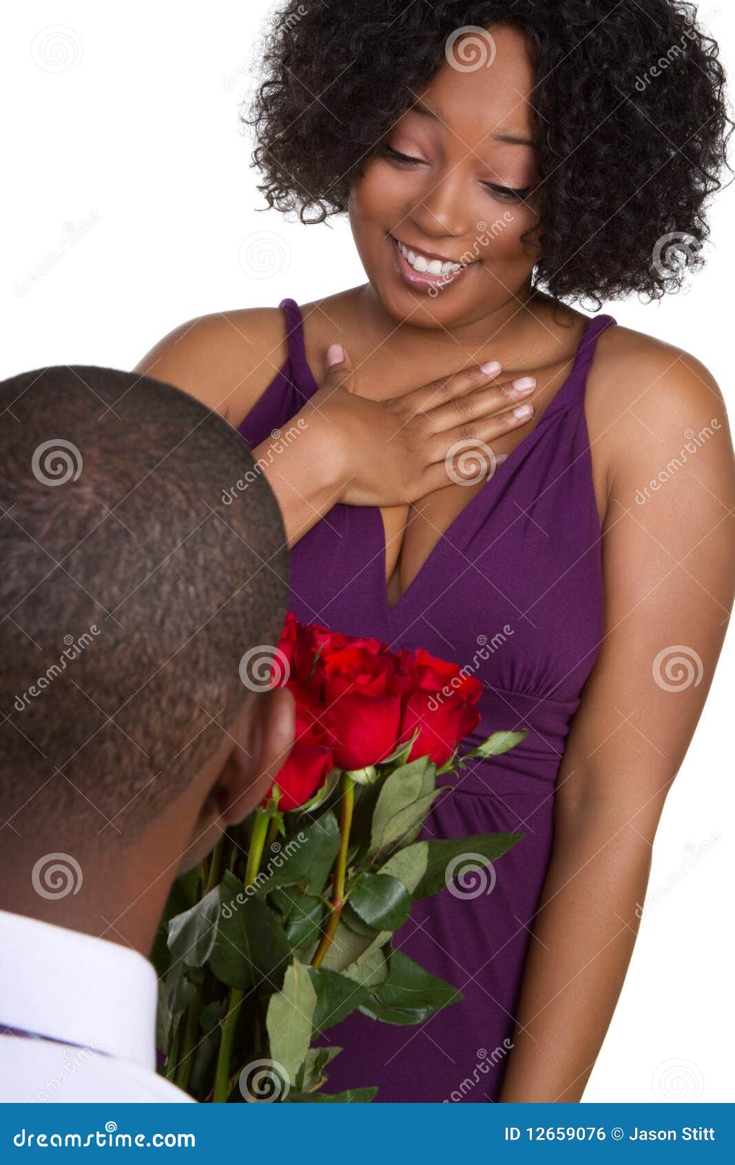 Man Giving Roses stock photo. Image of curly, african 12659076