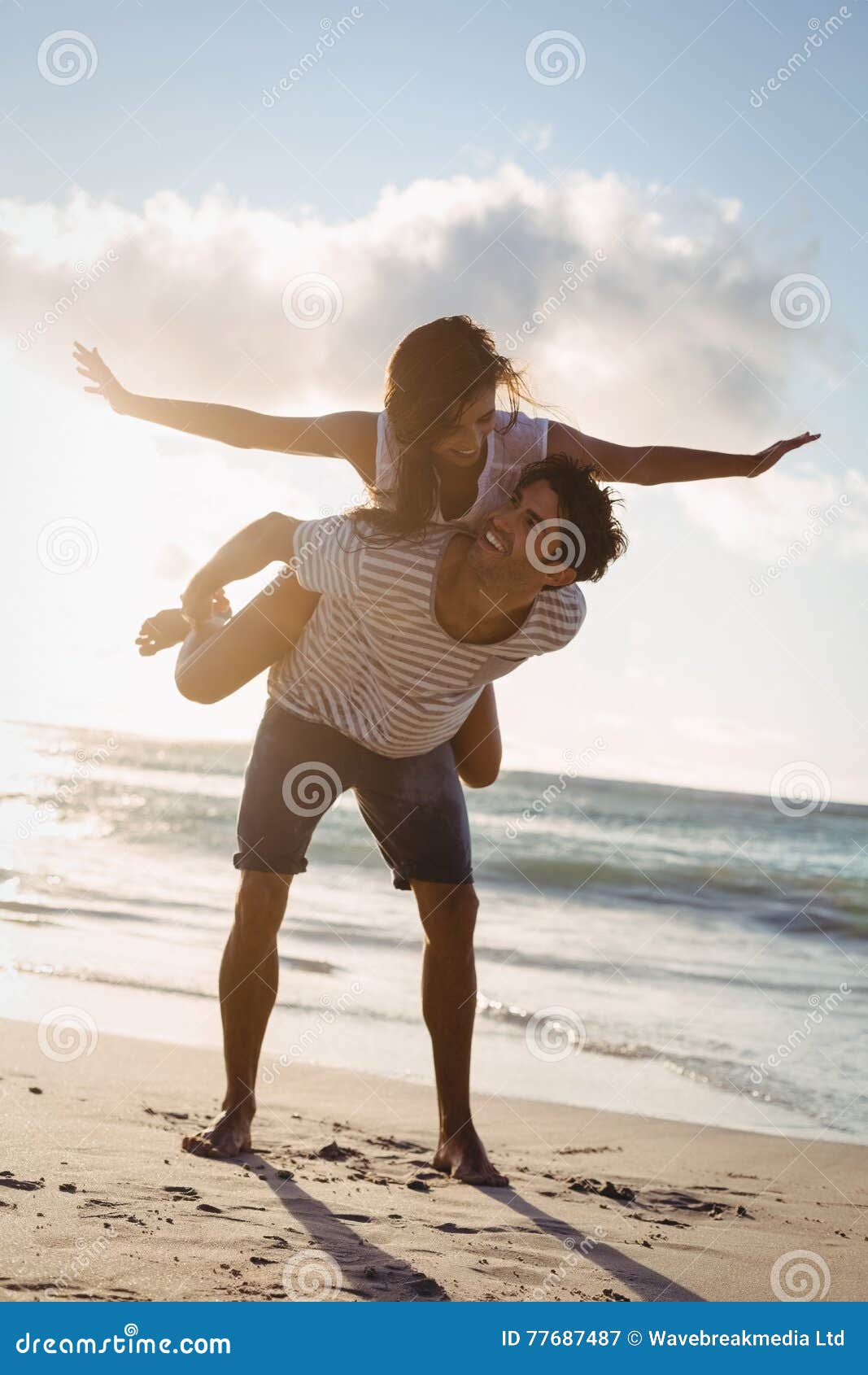 Midadult Caucasian Woman Giving Man Piggyback Stock Photo 3194063