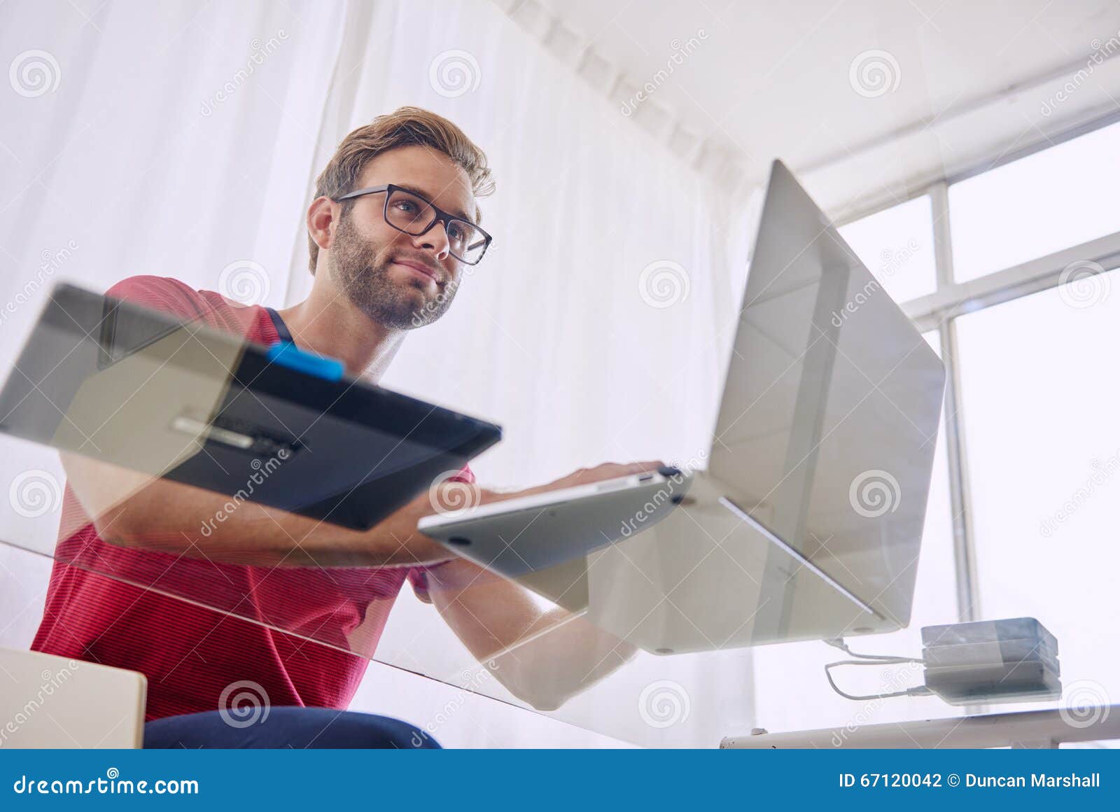 Man At Glass Desk Shot From Below Stock Photo Image Of Study