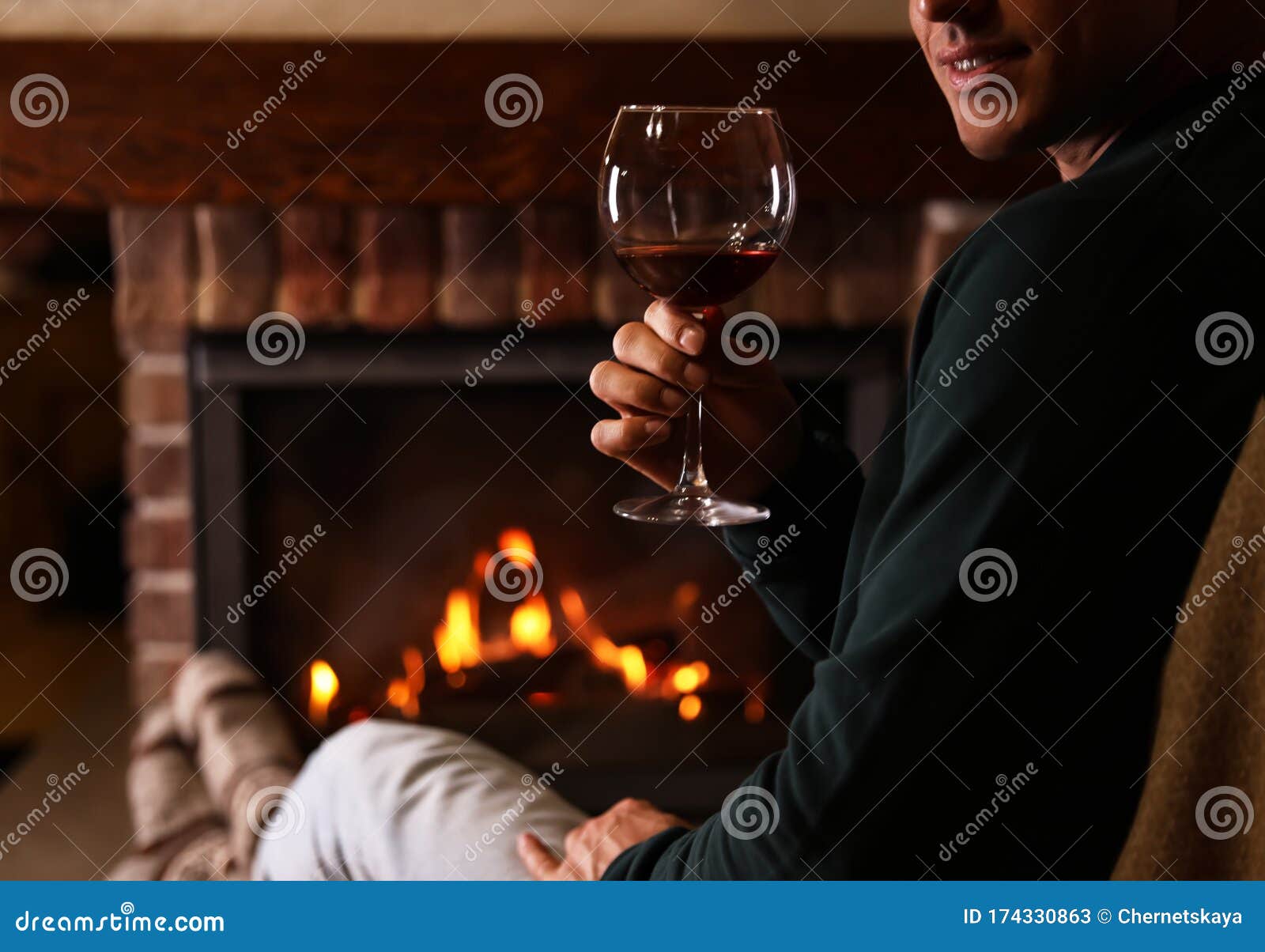 Man with Glass of Wine Near Fireplace at Home Stock Image - Image of ...