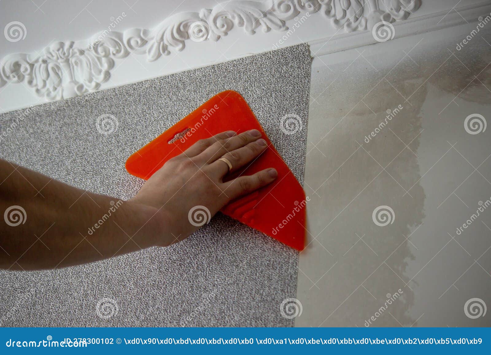 A Man Glues Wallpaper, Repairs the House Stock Photo Image of
