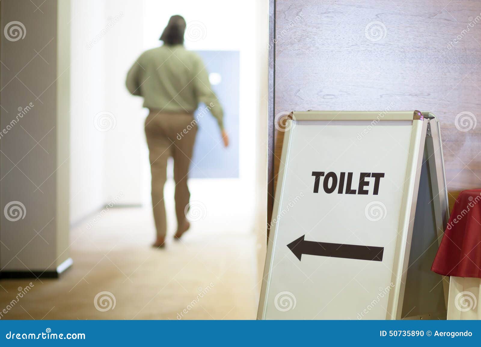 man going to toilet