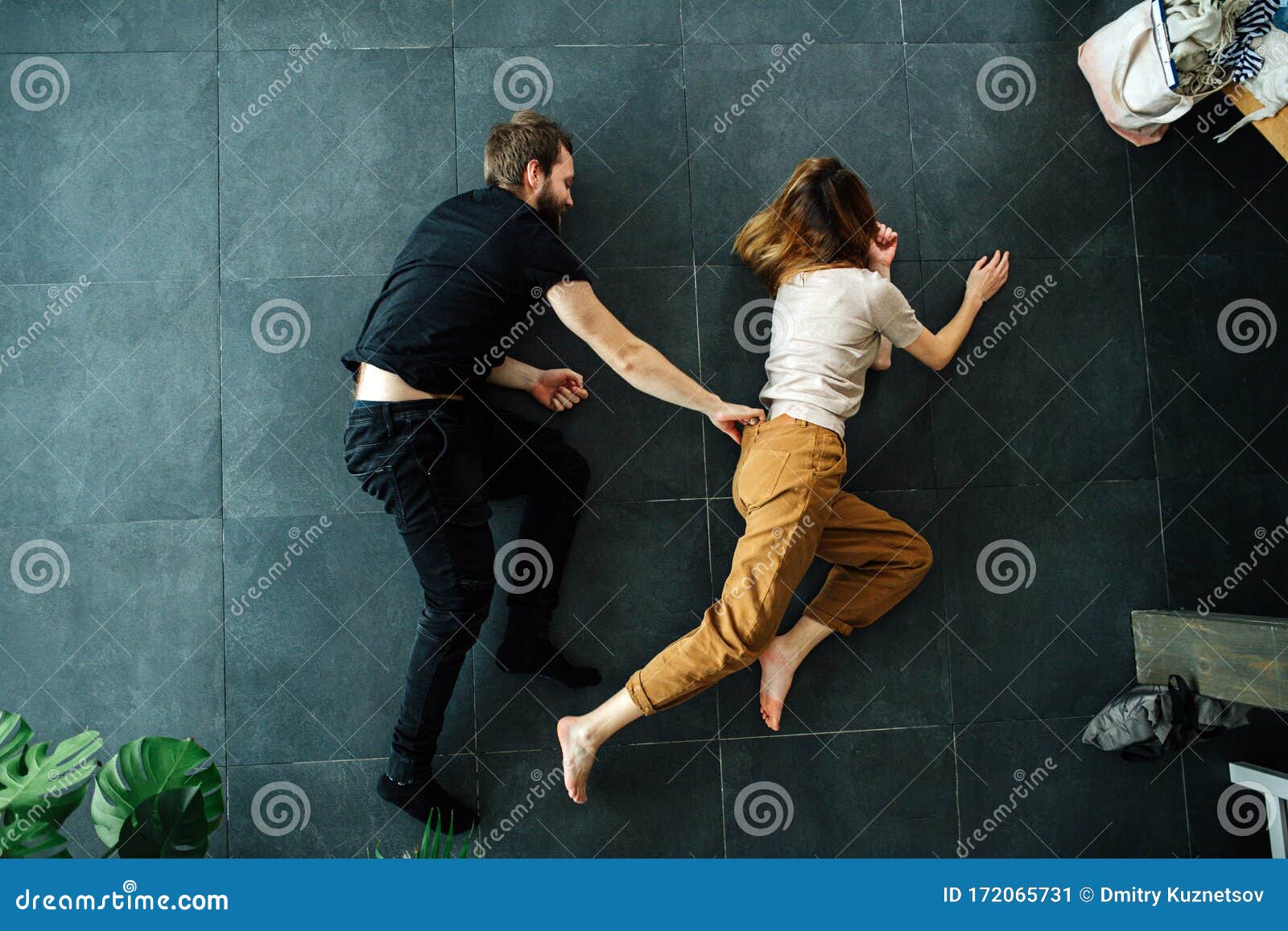 Man Grabs Woman By The Waist Band As A Part Of A Scene They Do On The