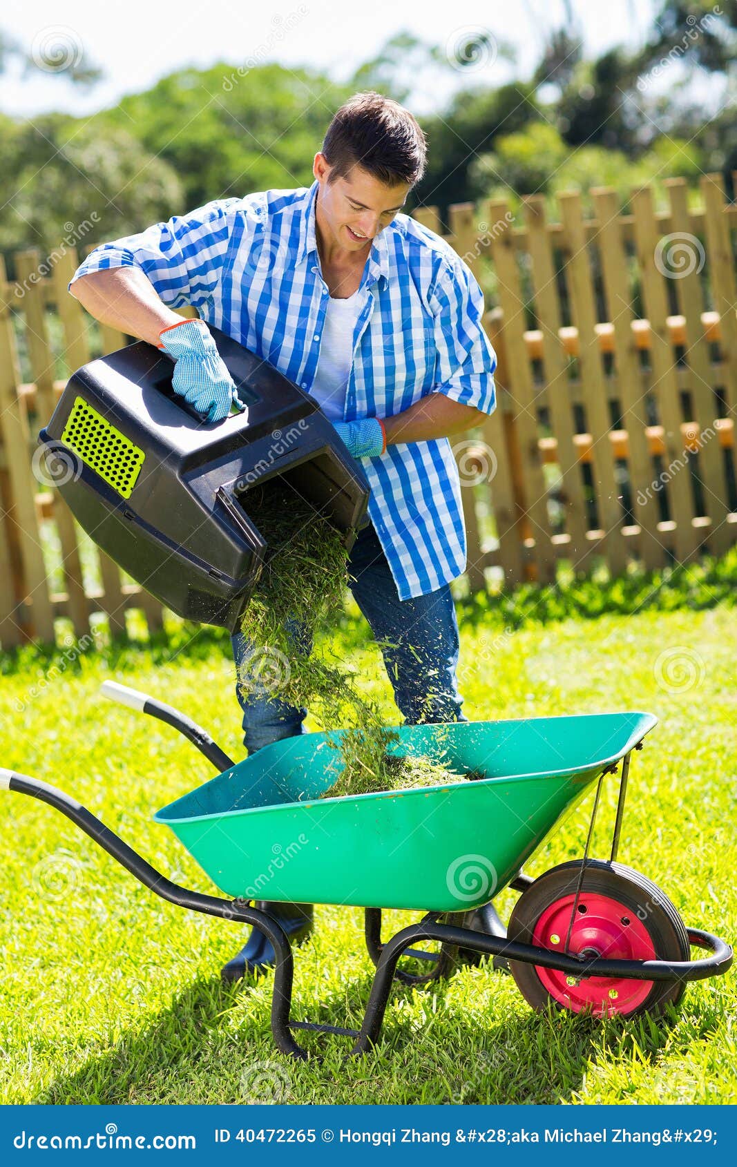Man grass wheelbarrow stock image. Image of lawnmower 40472265
