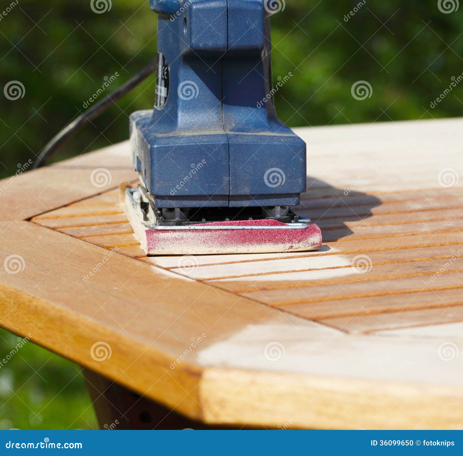Man grinds wood table from stock photo. Image of grain 36099650