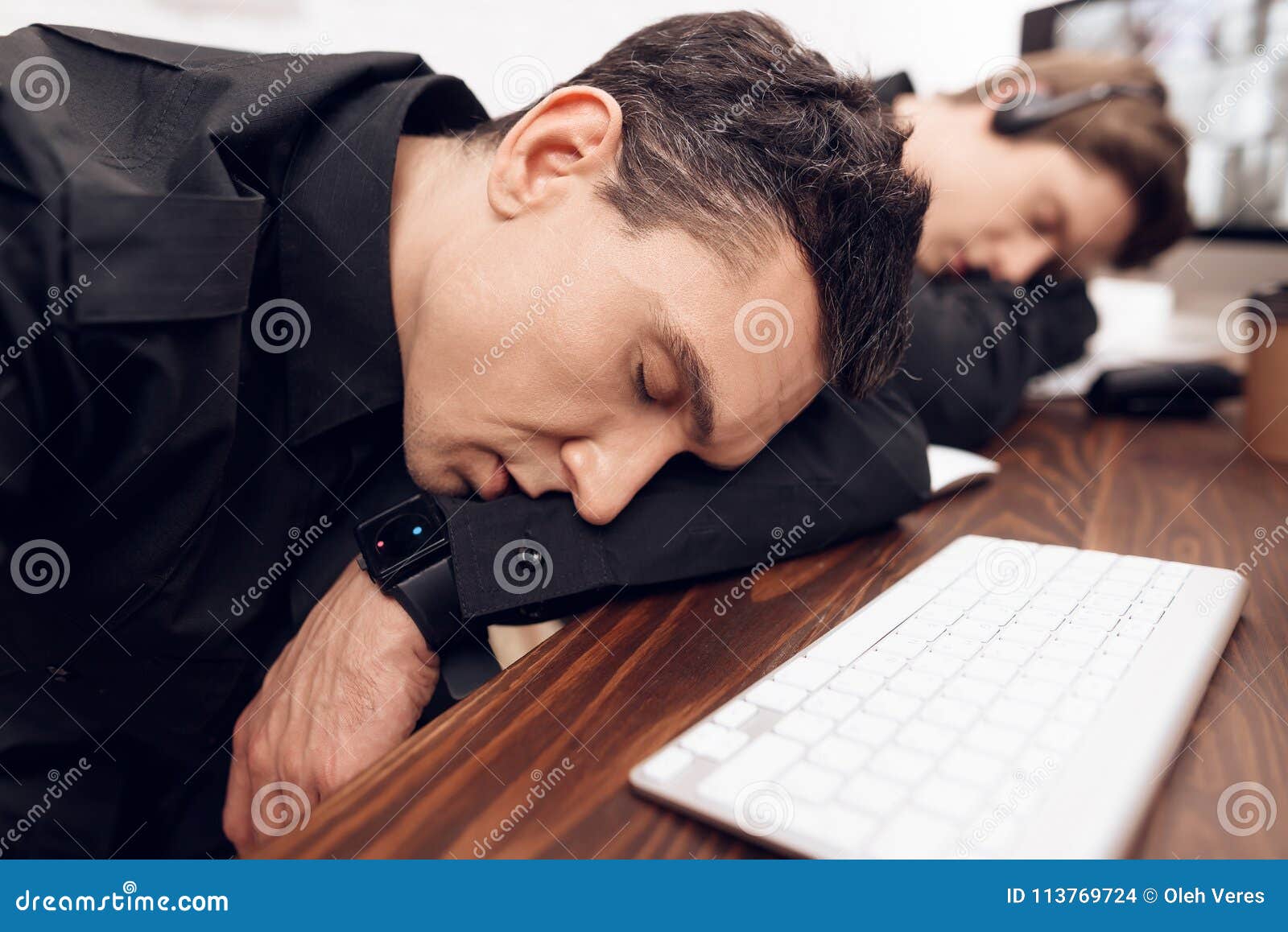 A Man Guard is Sleeping in the Workplace. Stock Photo Image of cctv