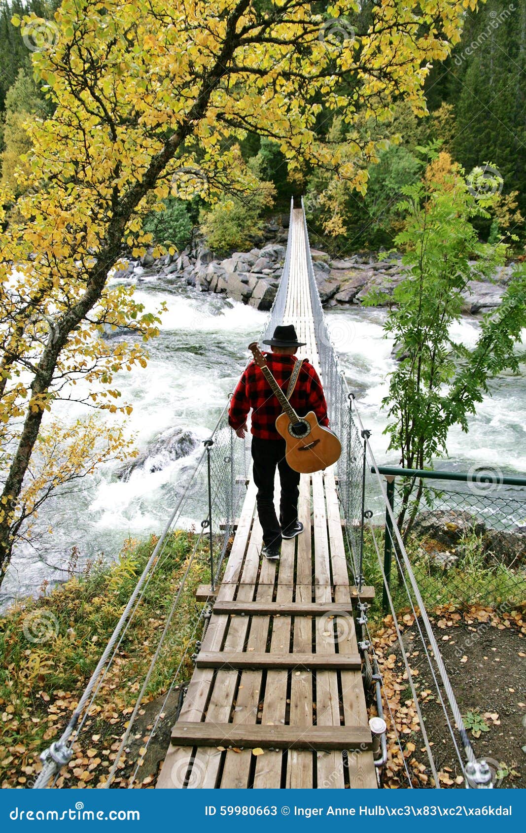 Man with guitar stock image. Image of carrying, cowboy 59980663