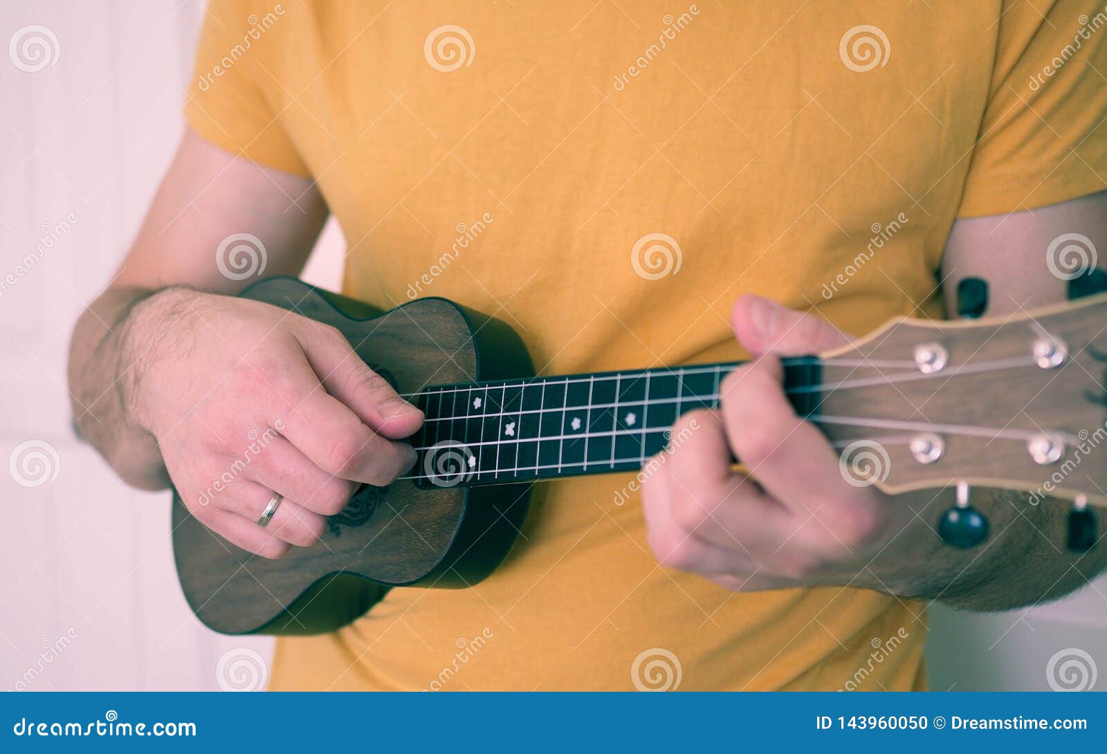 Man the Guy Playing the Ukulele Stock Photo Image of hands, acoustic