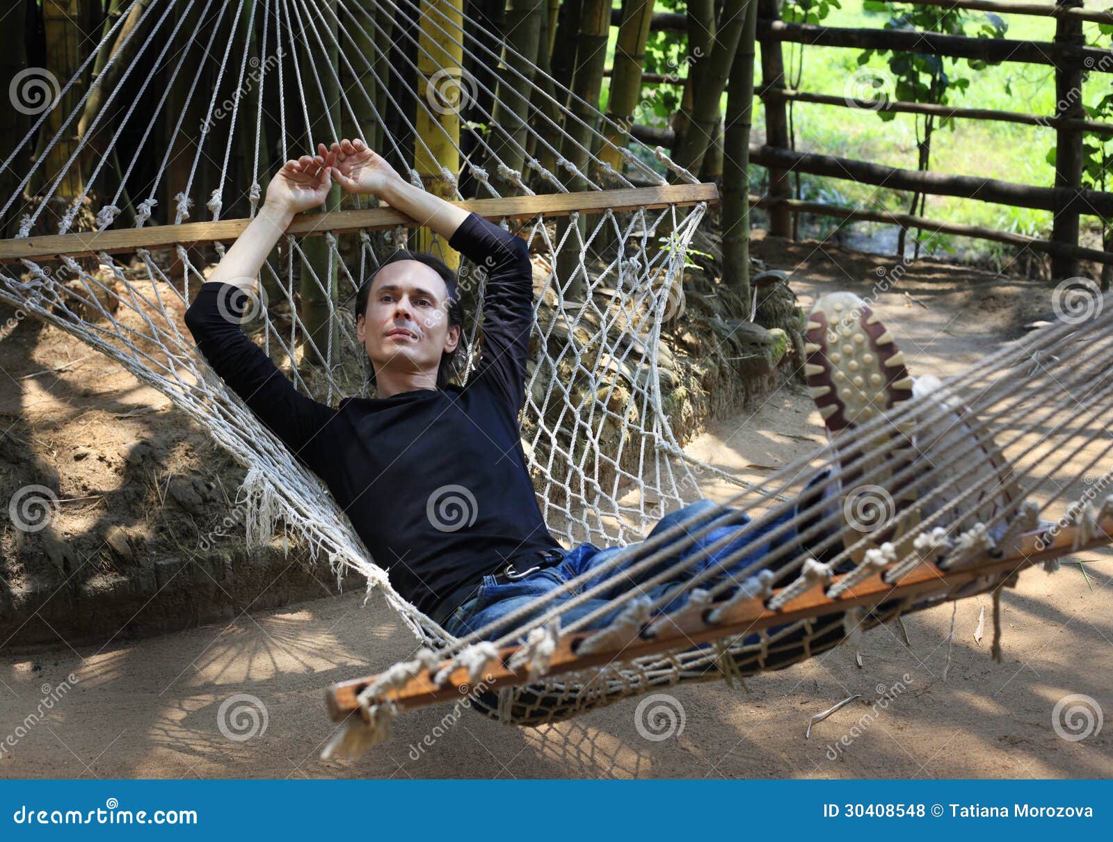 The man in a hammock stock photo. Image of leisure, relax 30408548