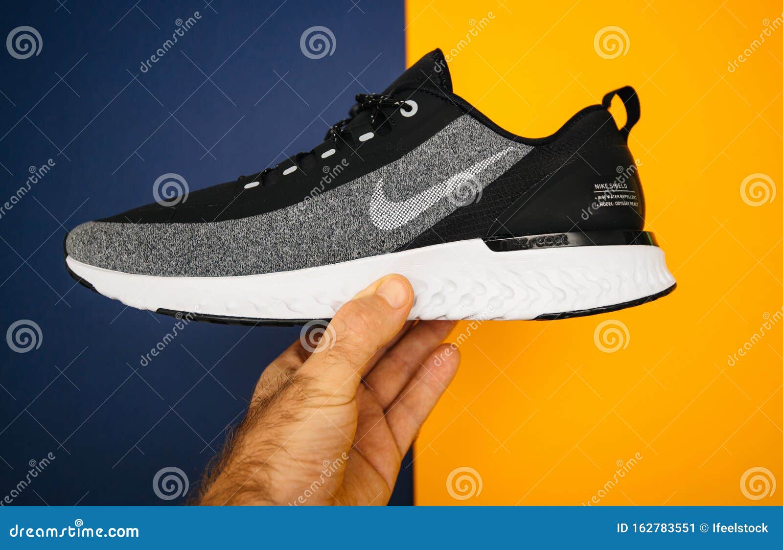 Man Hand Holding New Nike Running Shoe Odyssey React Shield Editorial ...