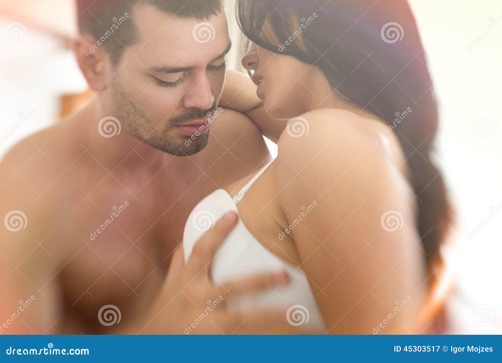 Man hand take woman breast stock image