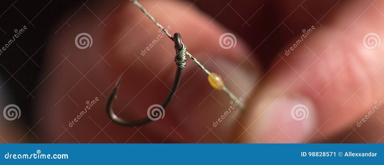 Man Hand Tying a Fishing Hook. Tie the Rig Stock Image - Image of bait,  detail: 98828571