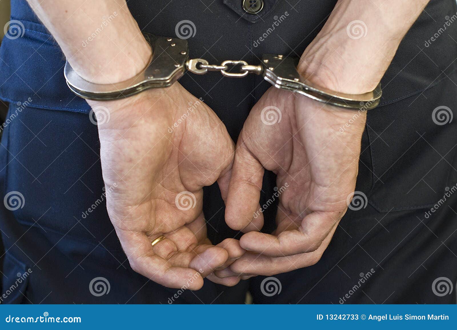 Man with handcuffs. stock image. Image of male, thief 13242733