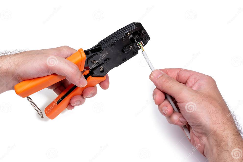 Man Hands Crimp Cable Whith Crimping Tool. Twisted Pair UTP