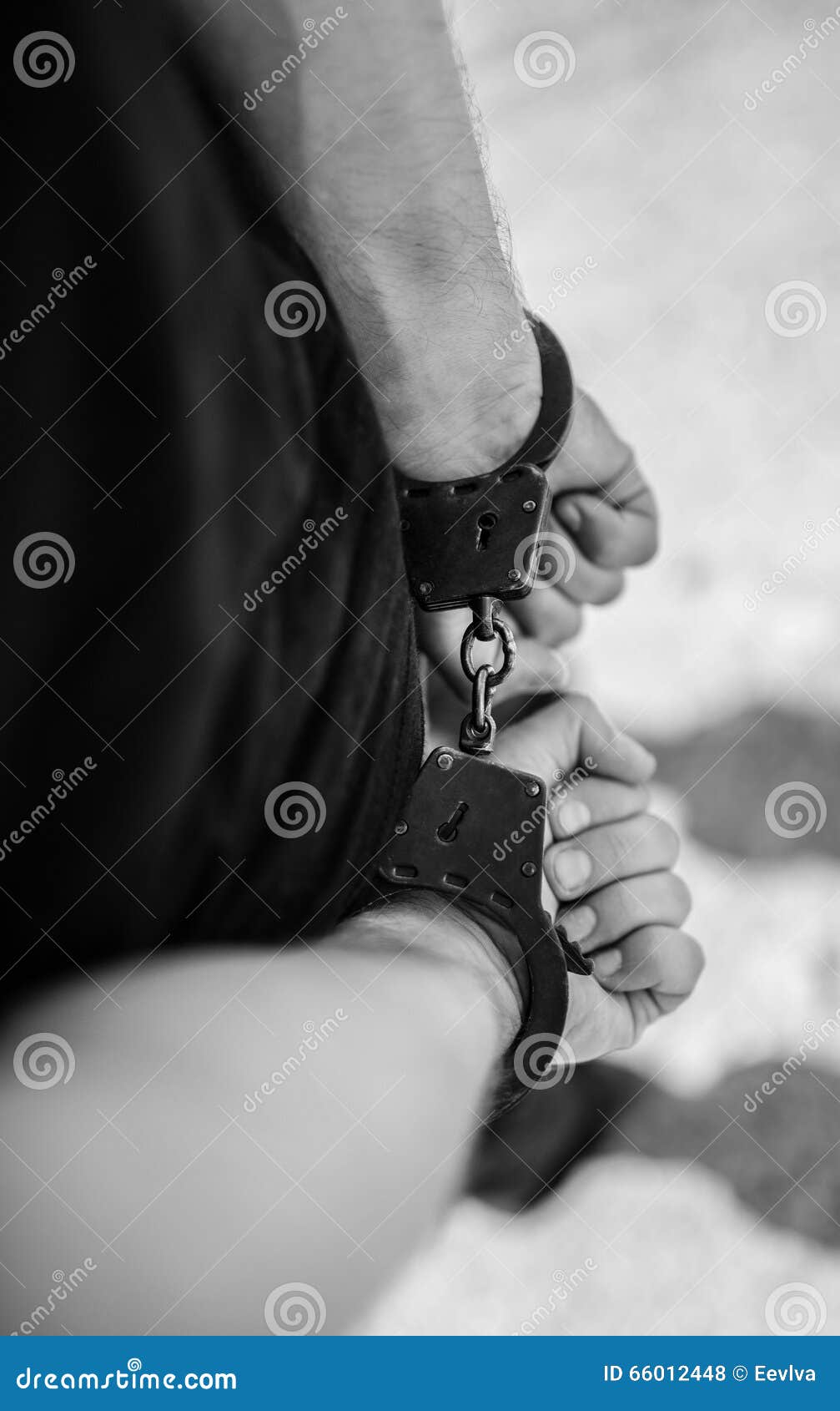 A man hands in handcuffs. stock photo. Image of legal 66012448