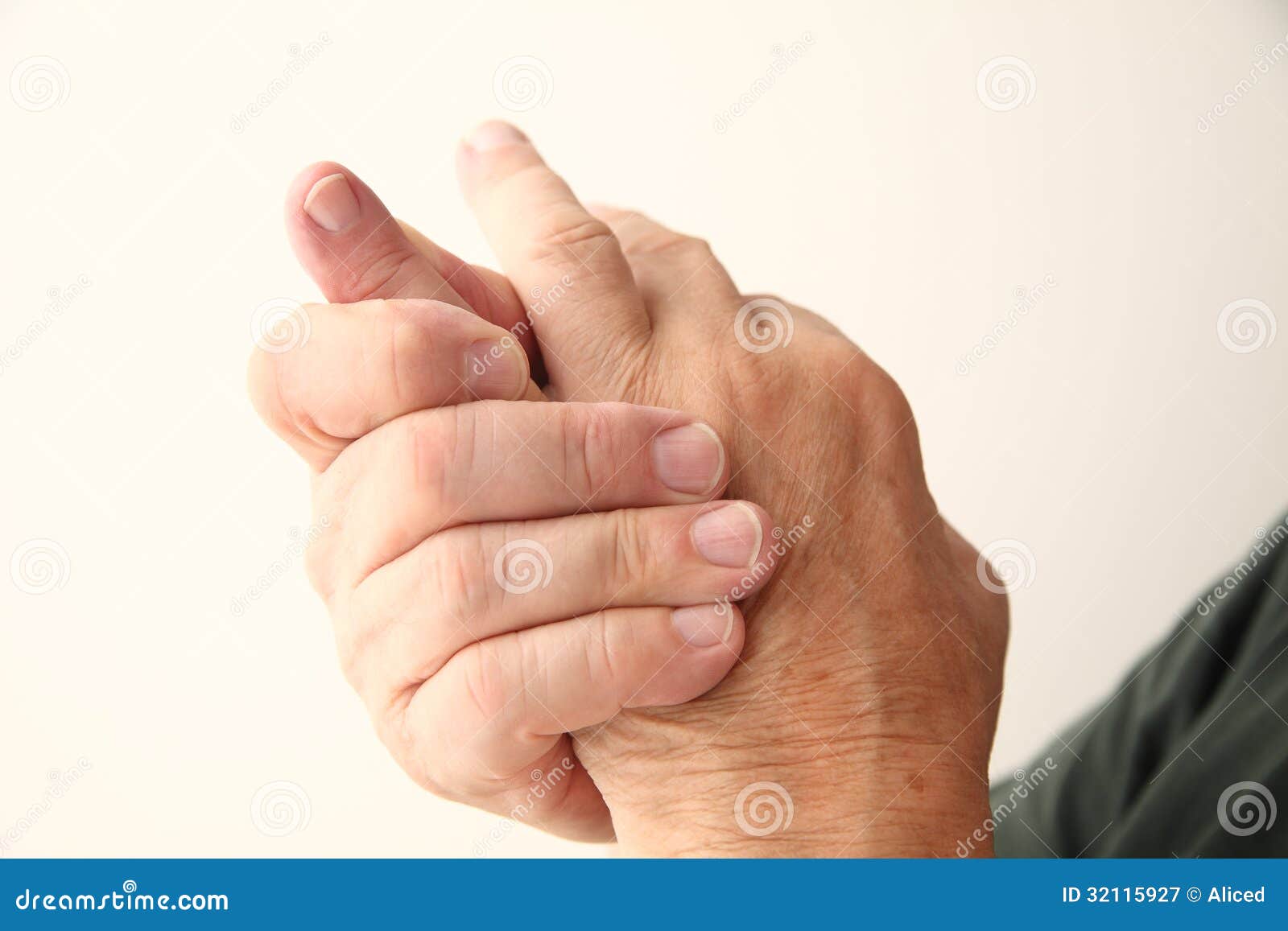 Man Has Pain In Pinky Finger Royalty Free Stock Photography - Image