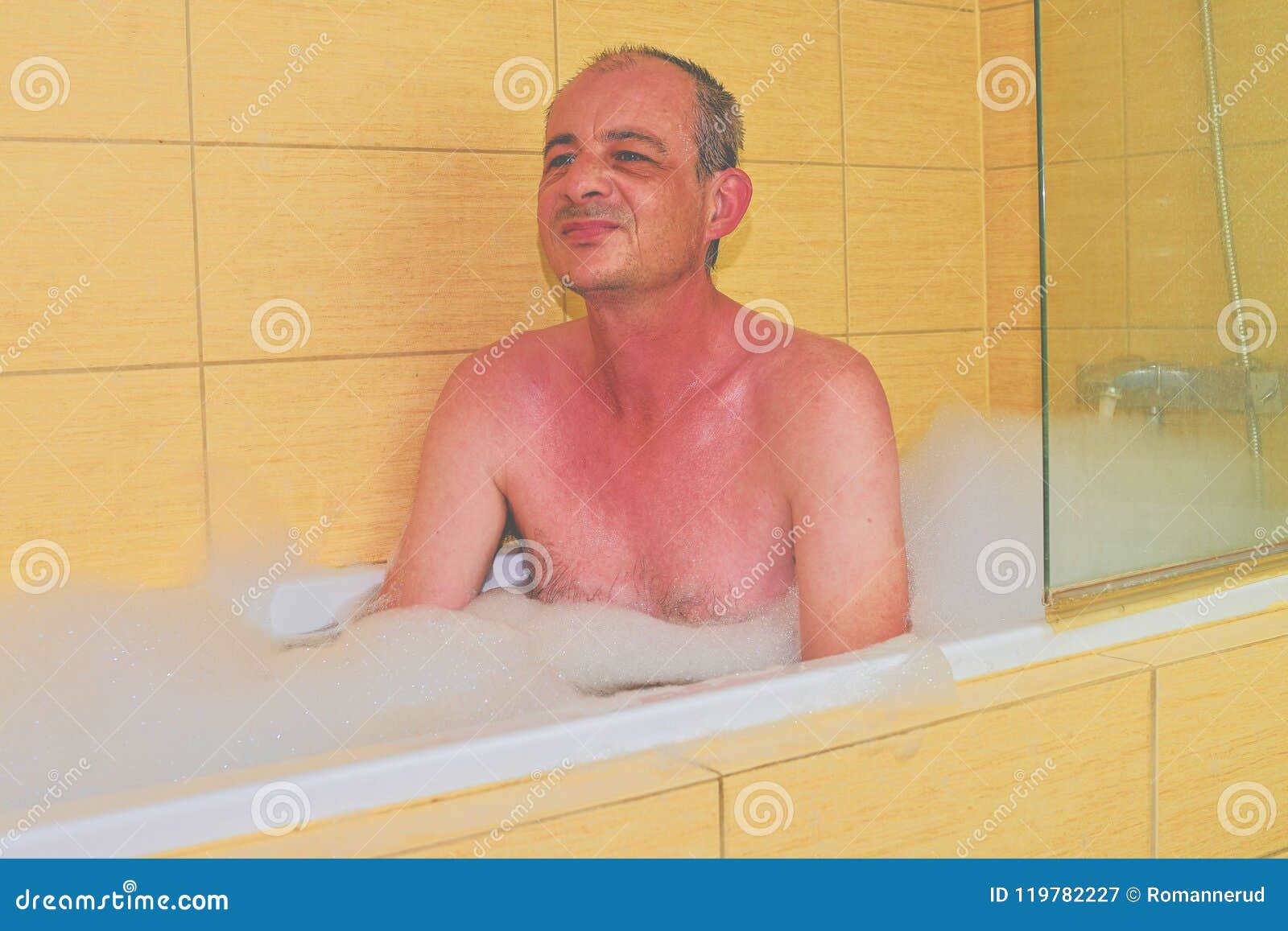 Man Having A Bath Middle Aged Man Is Relaxing In The Bath Full Of