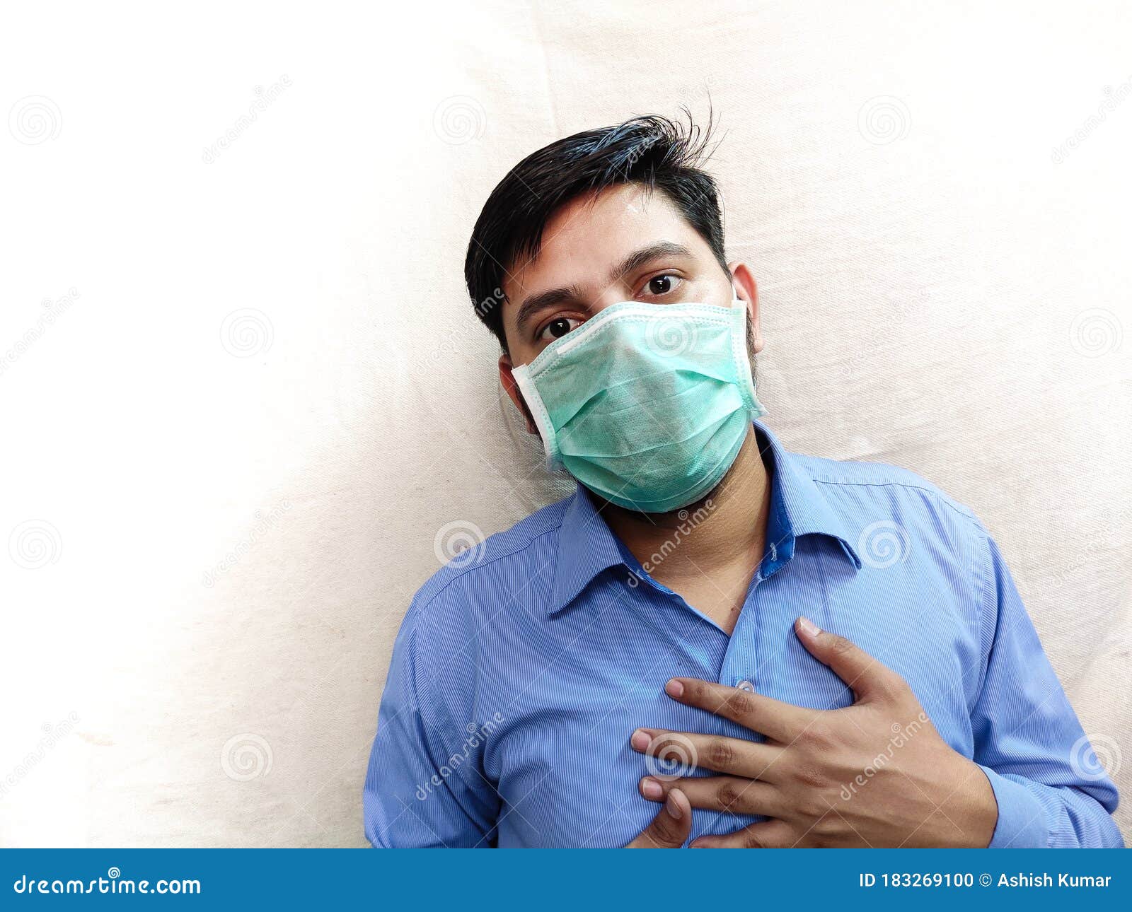 Man Having Chest Pain Difficulty in Breathing Wear Face Mask Hands on