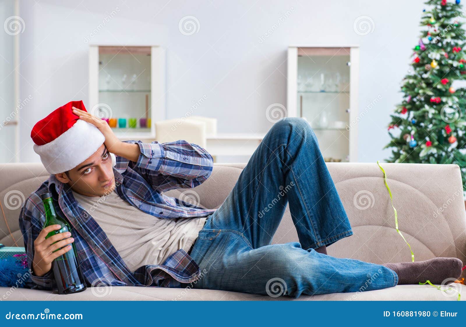 Man Having Hangover after Christmas Party Stock Photo Image of