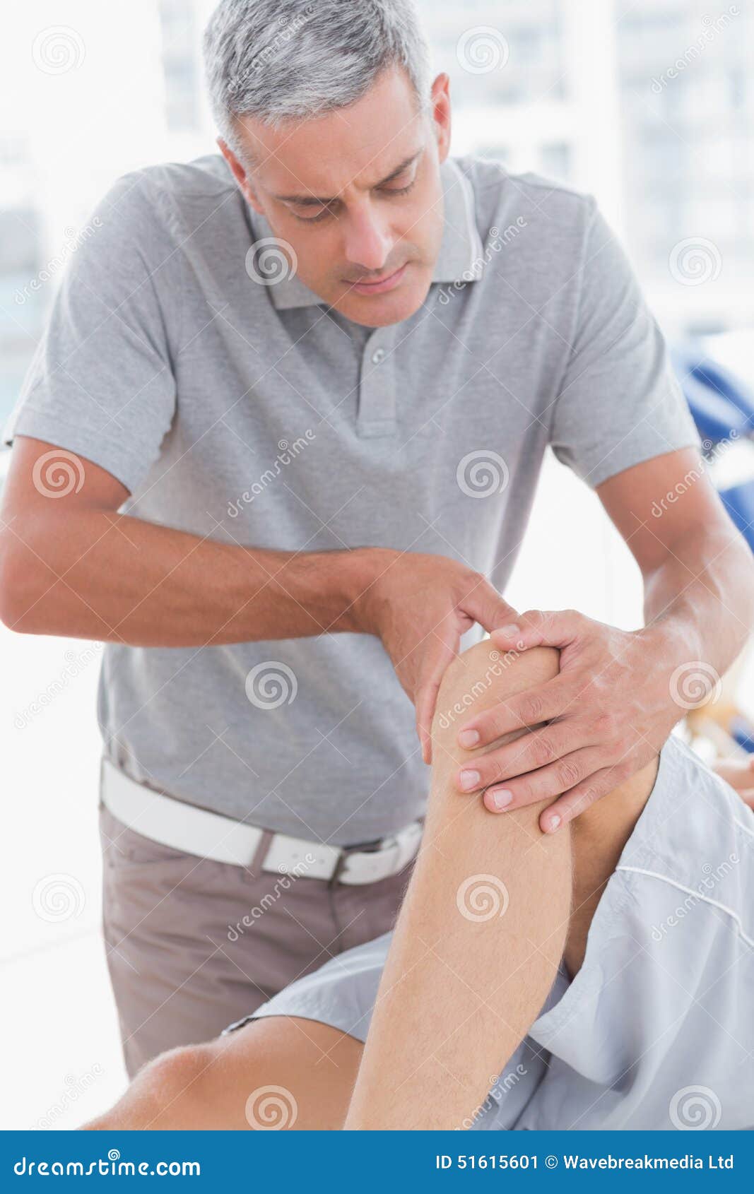 Man having knee massage stock image. Image of adult, physiotherapist