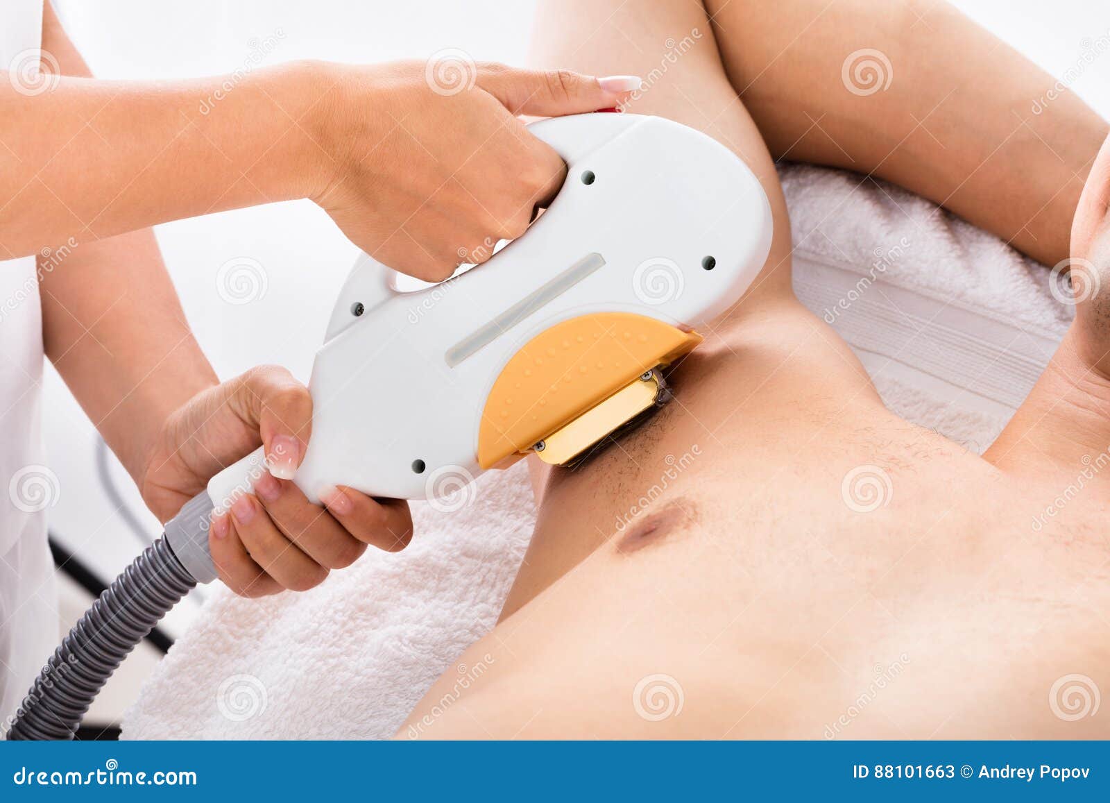 Man Having Underarm Laser Hair Removal Treatment Stock Image