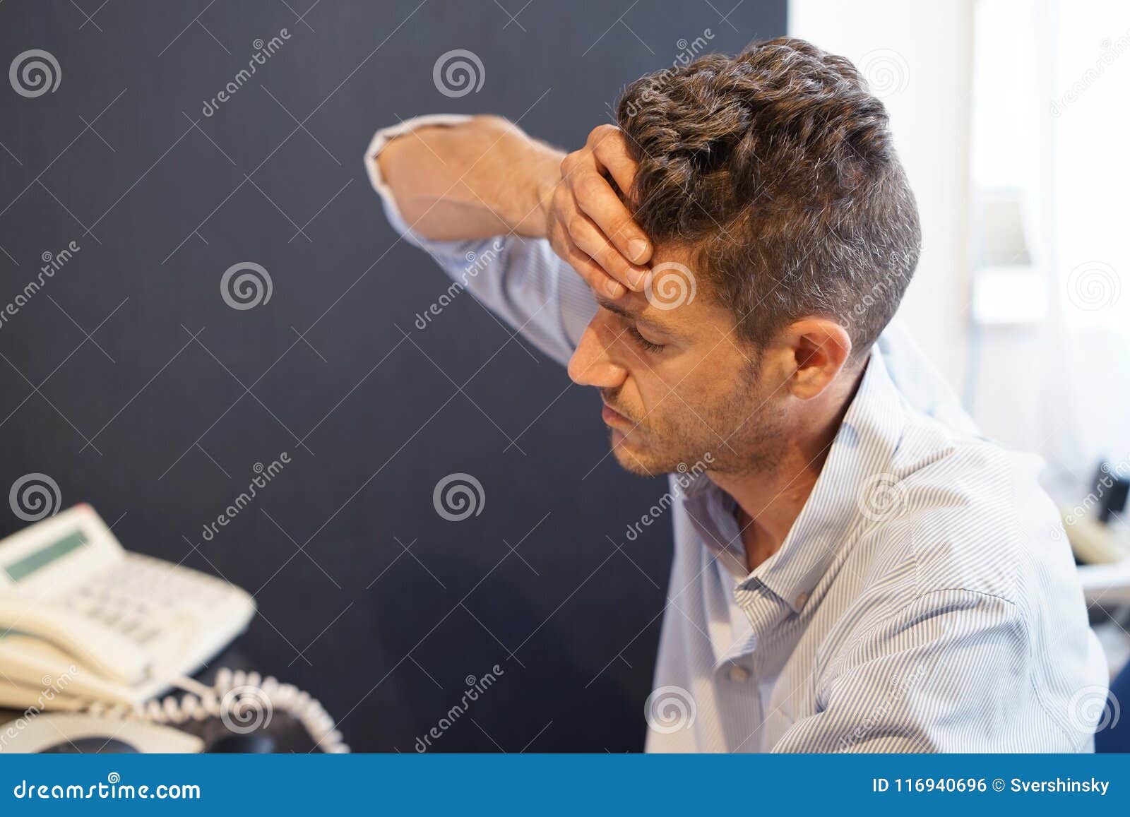 Man with a Headache in Front of the Computer Stock Photo Image of