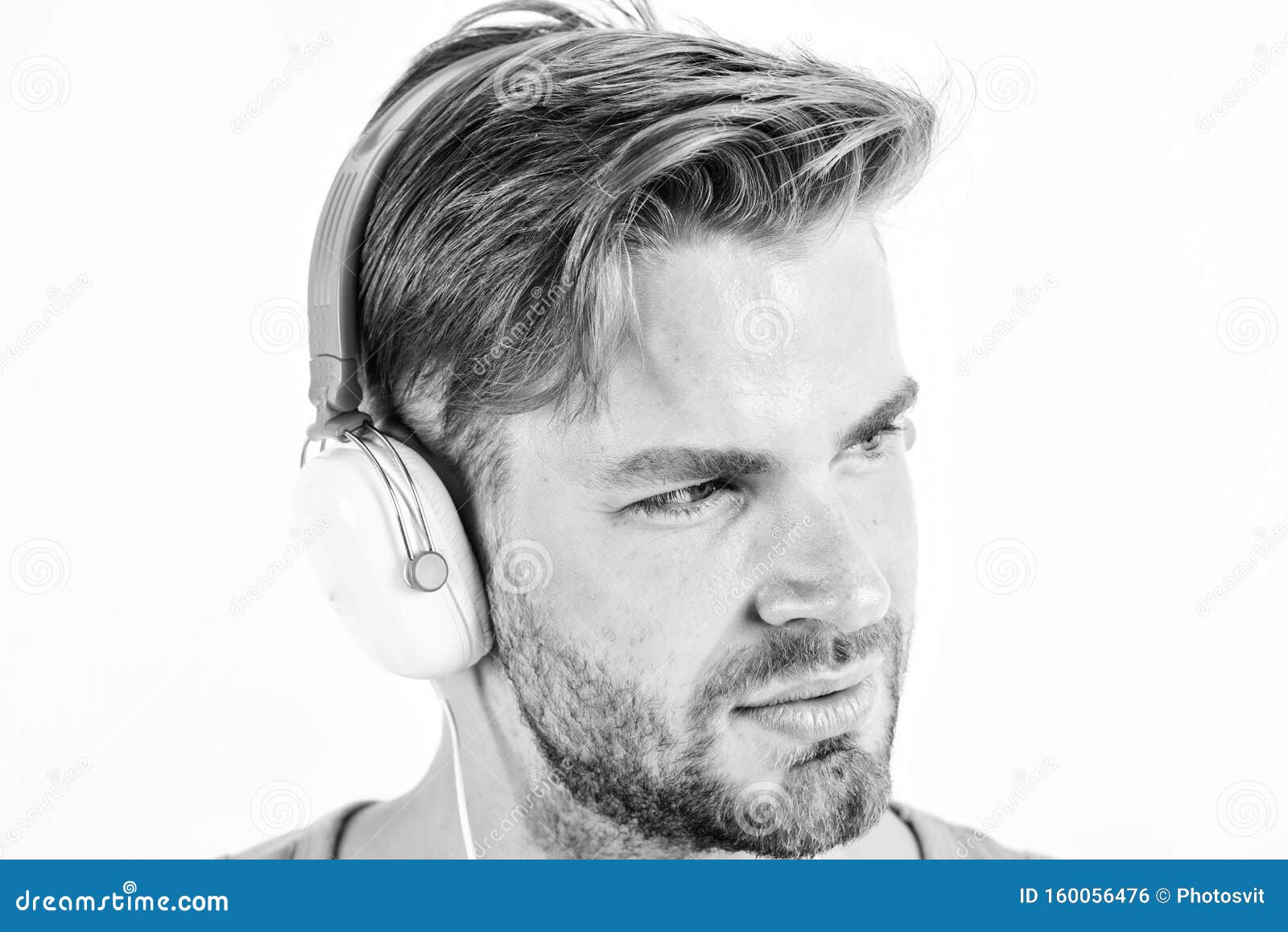 Man In Headphones Unshaven Man Listening Music In Headset