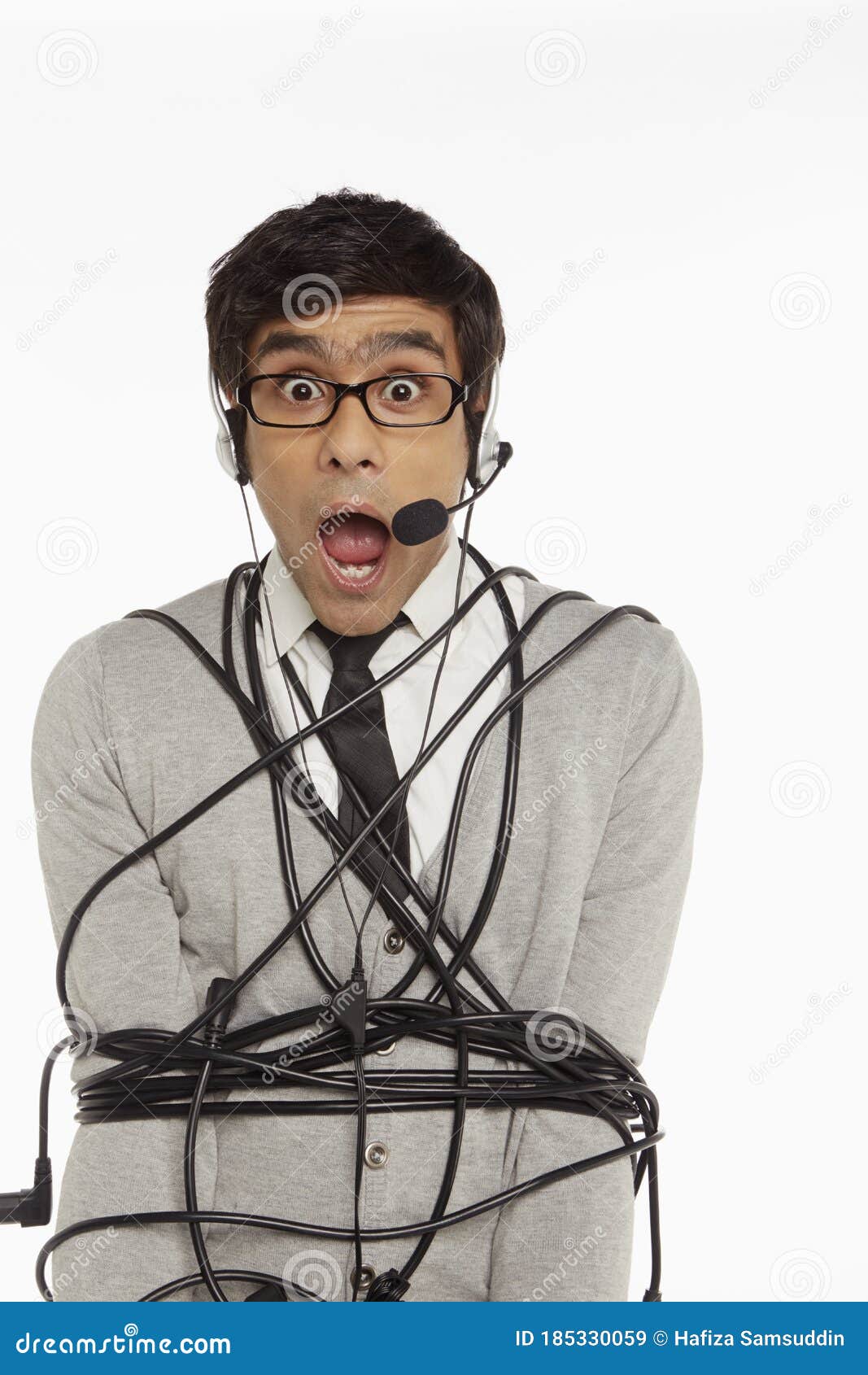 Man with Headset Wrapped in a Tangled Cable Stock Image Image of