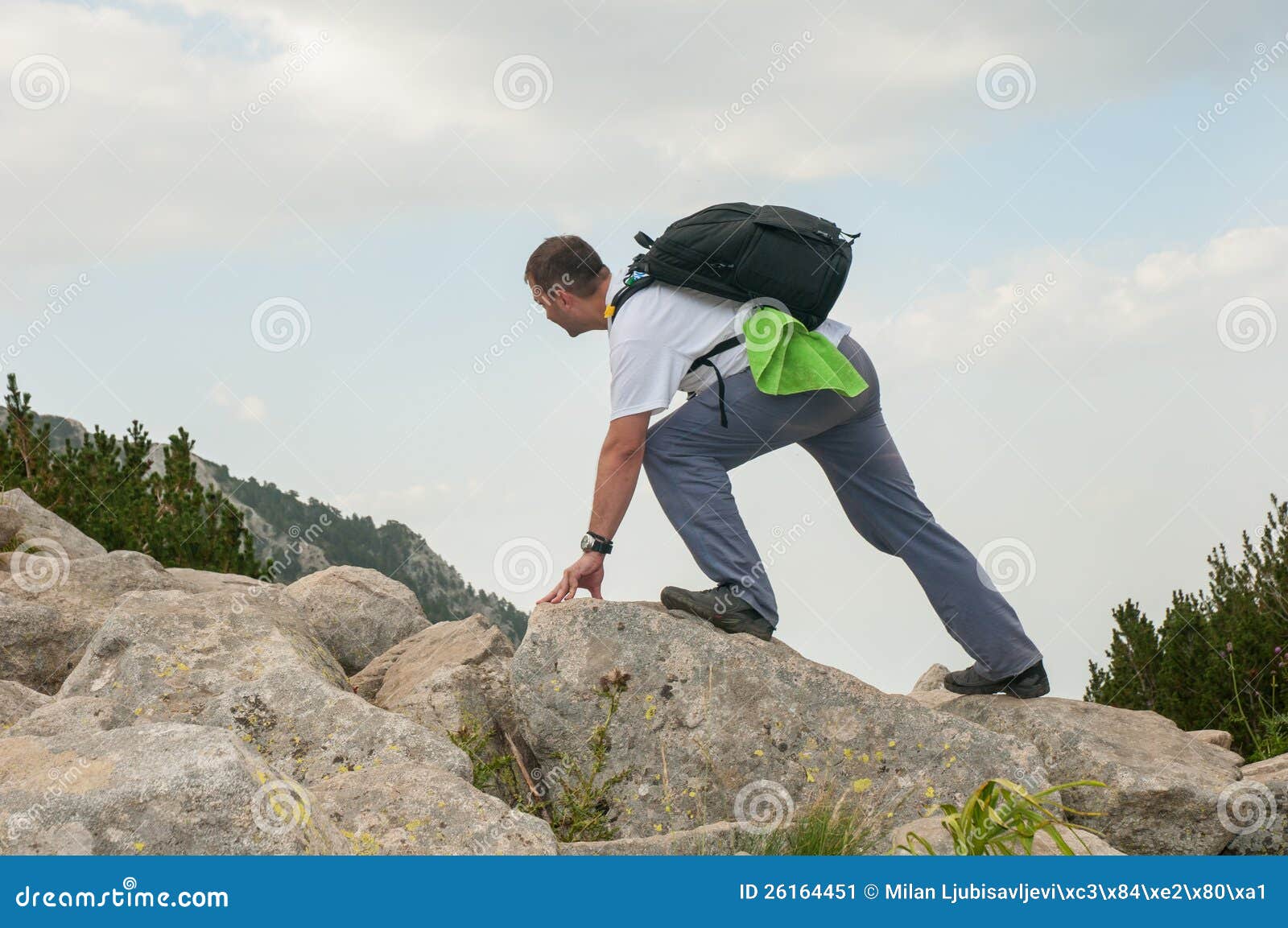Man Hiking on Rocks stock image. Image of pole, trekking 26164451