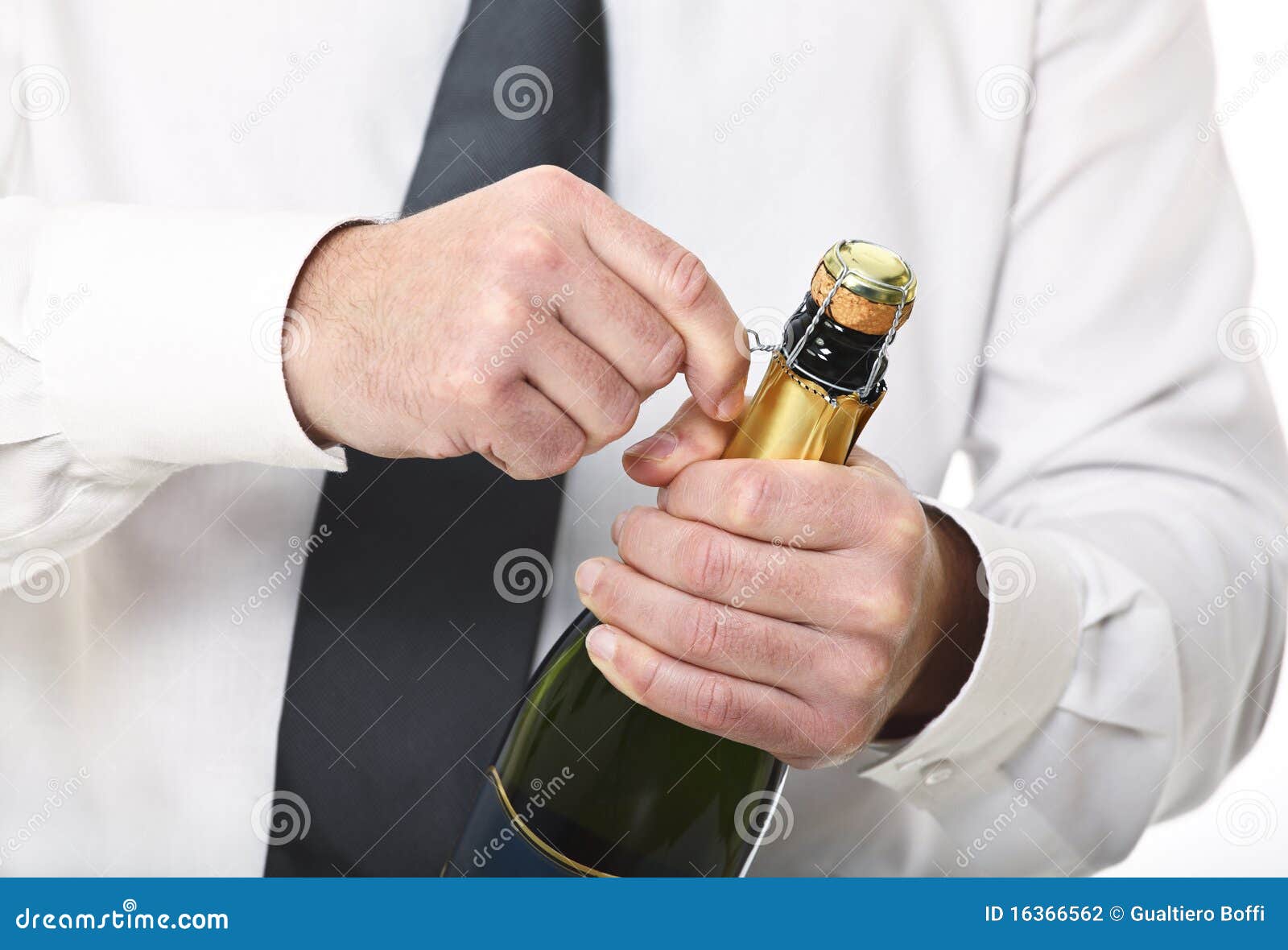 Man hold champagne bottle stock photo. Image of open 16366562