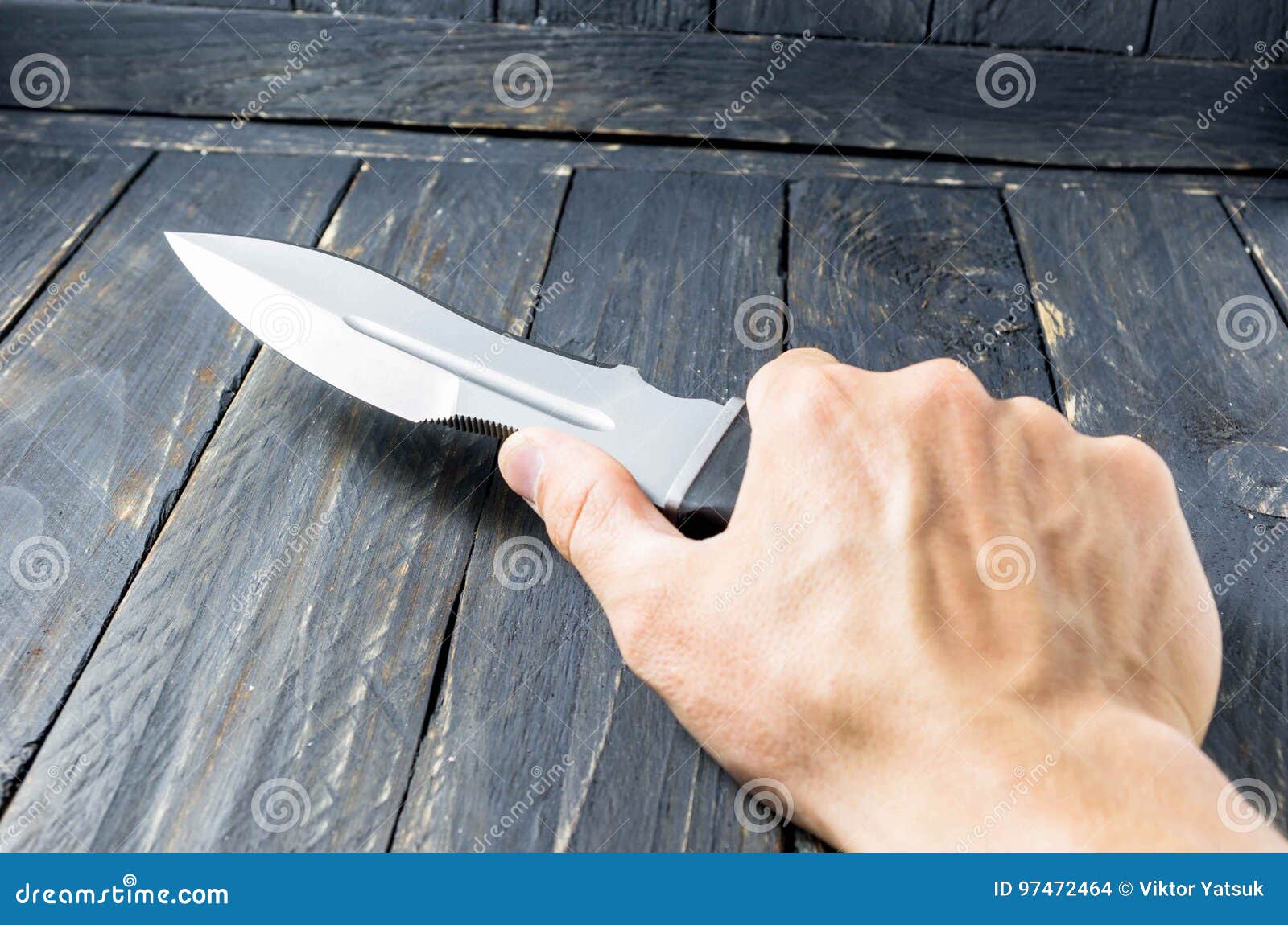 Man Hold Large Military Knife in Right Hand. Stock Photo Image of