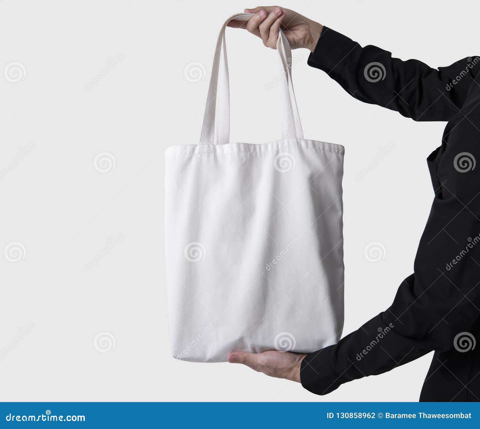 Man Is Holding Bag Canvas Fabric For Mockup Blank Template ...