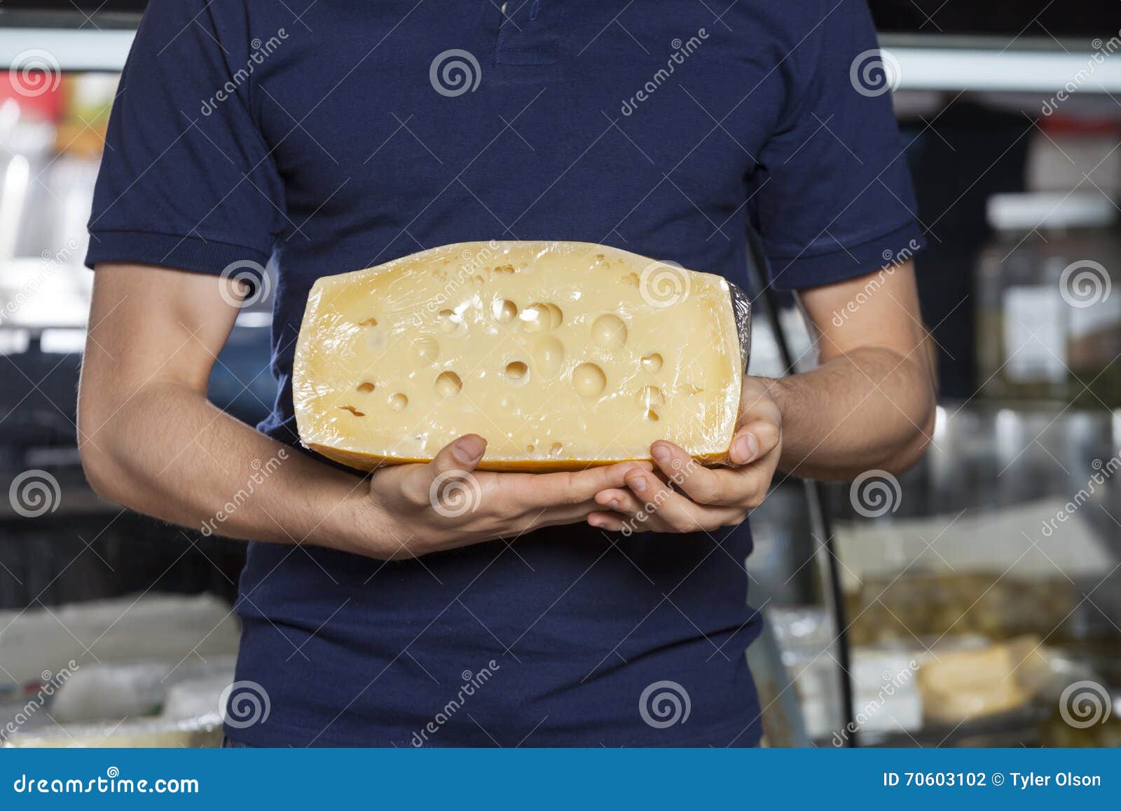 Man Holding Cheese in Grocery Store Stock Photo Image of purchase