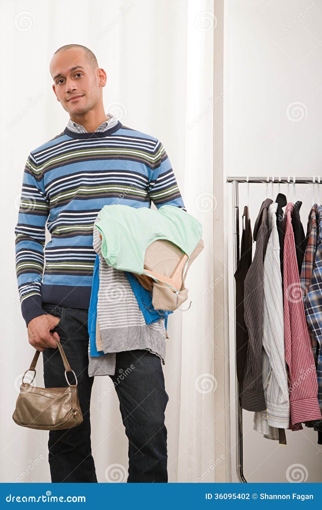 Man Holding Clothes and Handbag Stock Photo Image of adulthood