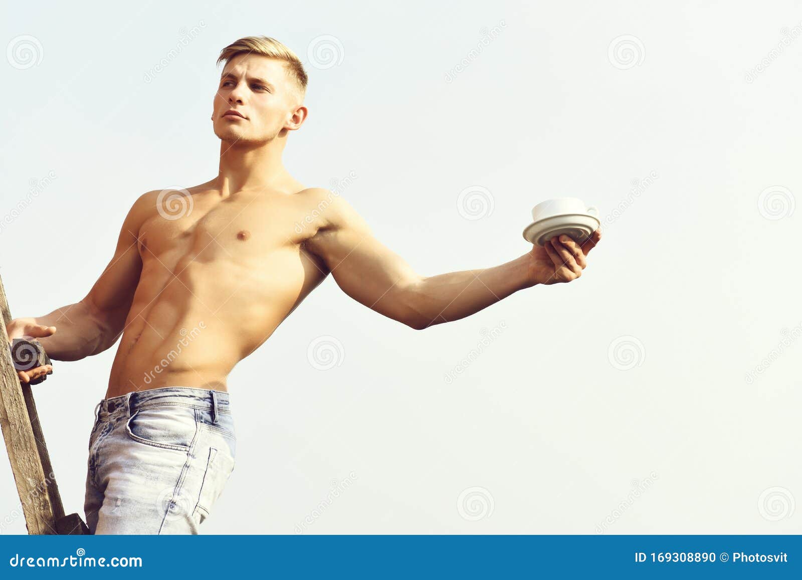 Man Holding Cup Of Coffee On Sky Background, Serious Face Stock Photo ...